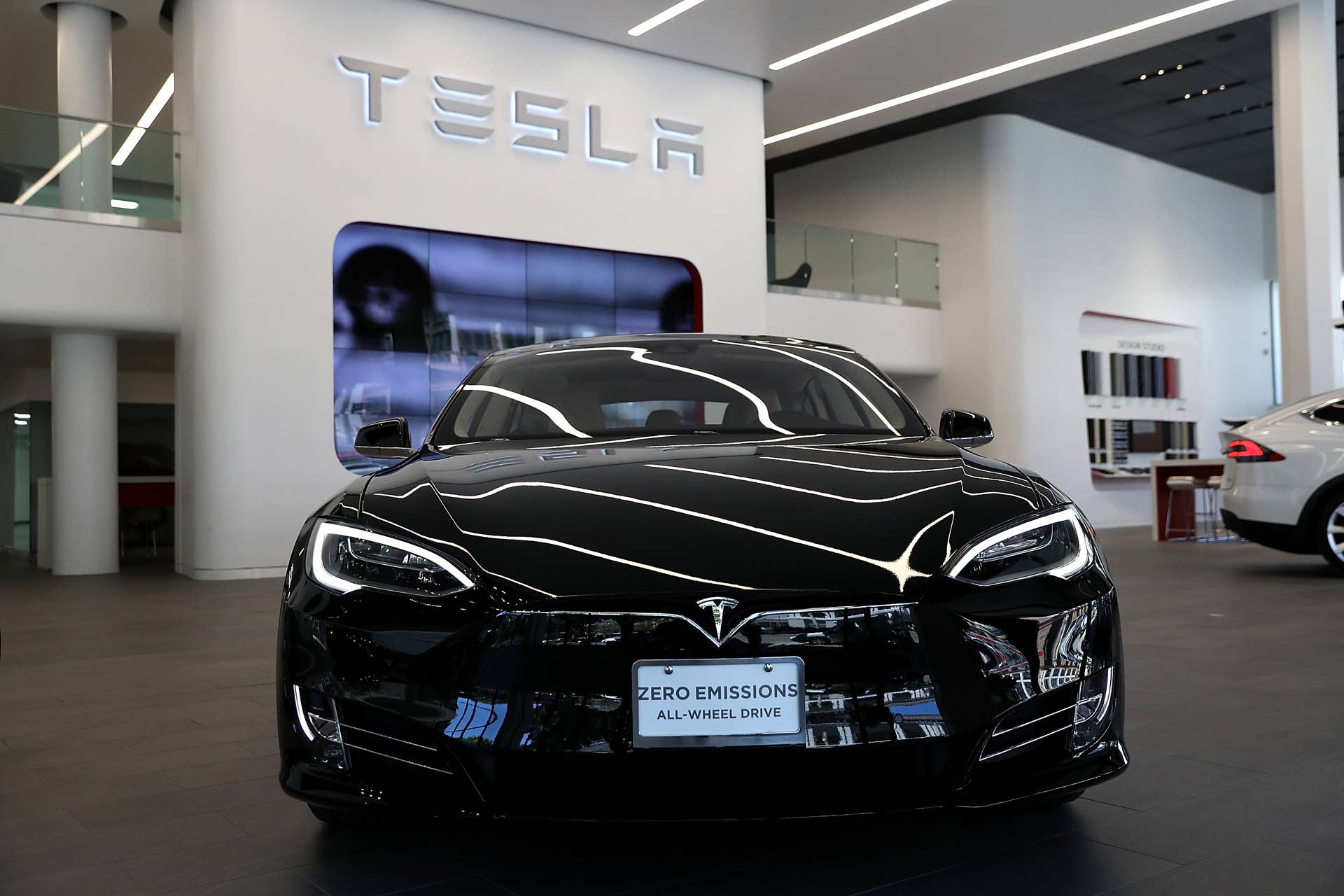 SAN FRANCISCO, CA - AUGUST 10: A Tesla Model S is displayed inside of the new Tesla flagship facility on August 10, 2016 in San Francisco, California. Tesla is opening a 65,000 square foot store, its largest retail center to date. The facility will offer sales and service of Tesla's electric car line. (Photo by Justin Sullivan/Getty Images)