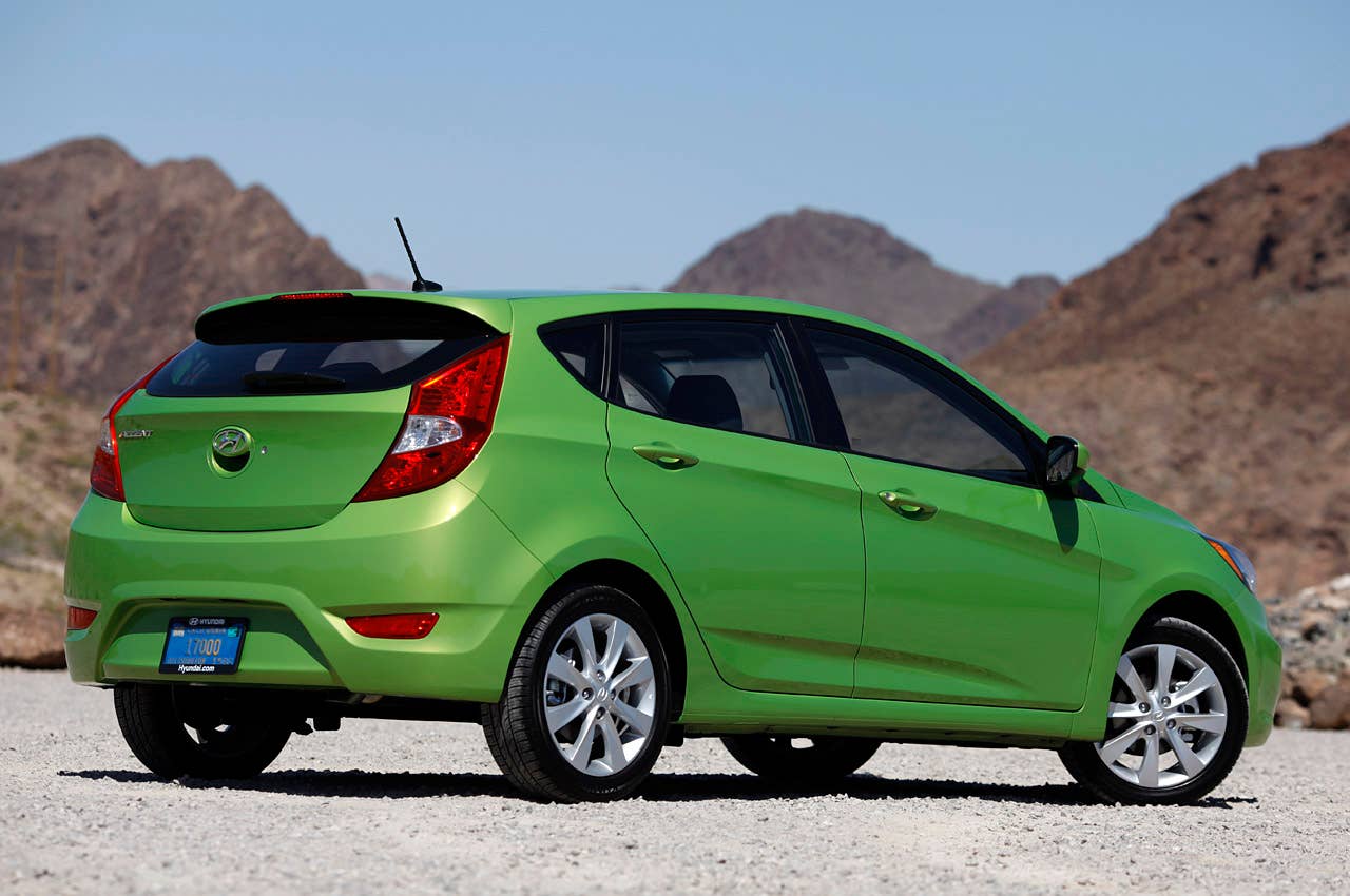 2012 Hyundai Accent Five-Door rear 3/4 view