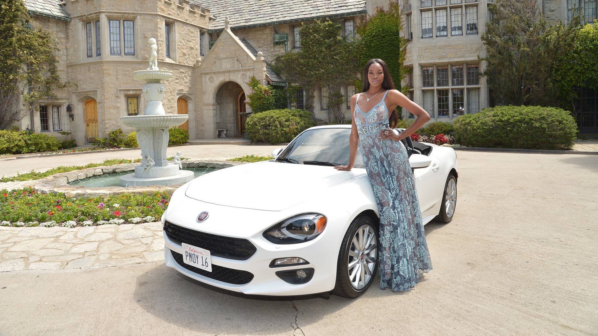 Eugena Washington with Fiat 124 Spider