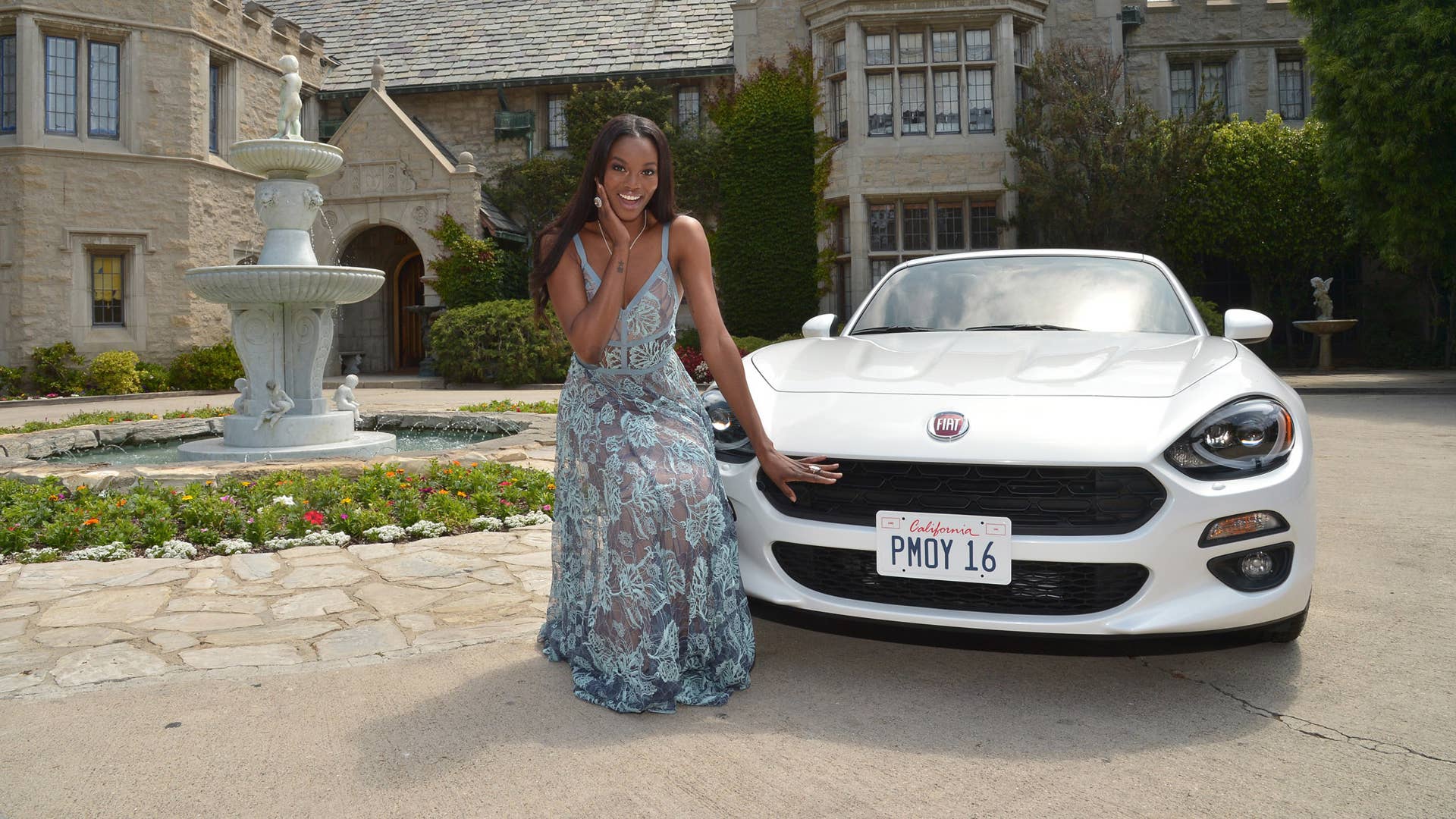 Playboy Eugena Washington with Fiat 124 Spider