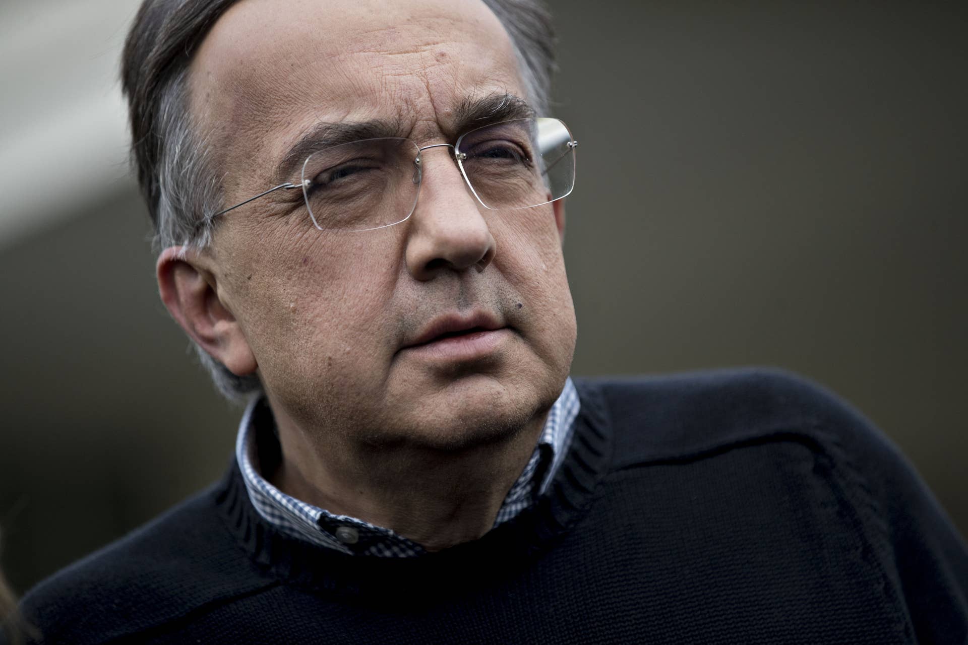 Sergio Marchionne, chief executive officer of Fiat Chrysler Automobiles NV, listens during a news conference outside the White House after a meeting with U.S. President Donald Trump, not pictured, in Washington, D.C., U.S., on Tuesday, Jan. 24, 2017. Trump told chief executives of the three biggest U.S. automakers that environmental regulations are out of control and promised he would remove obstacles for manufacturers and oil companies. Photographer: Andrew Harrer/Bloomberg via Getty Images