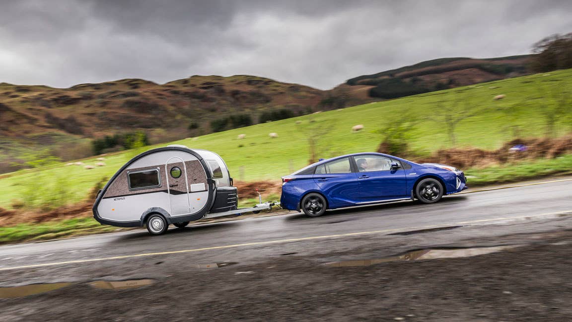 2016 Toyota Prius with trailer moving