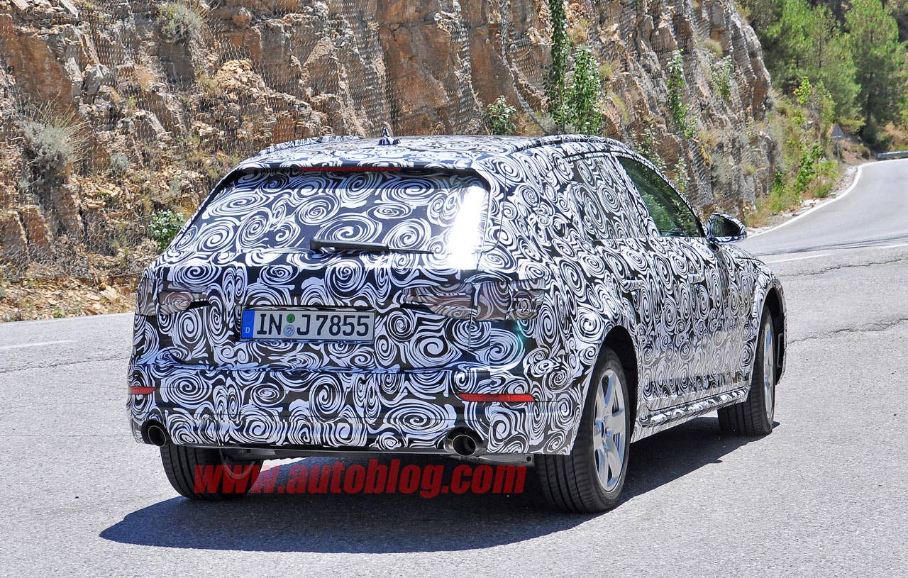 camouflaged audi a4 allroad spy shots rear