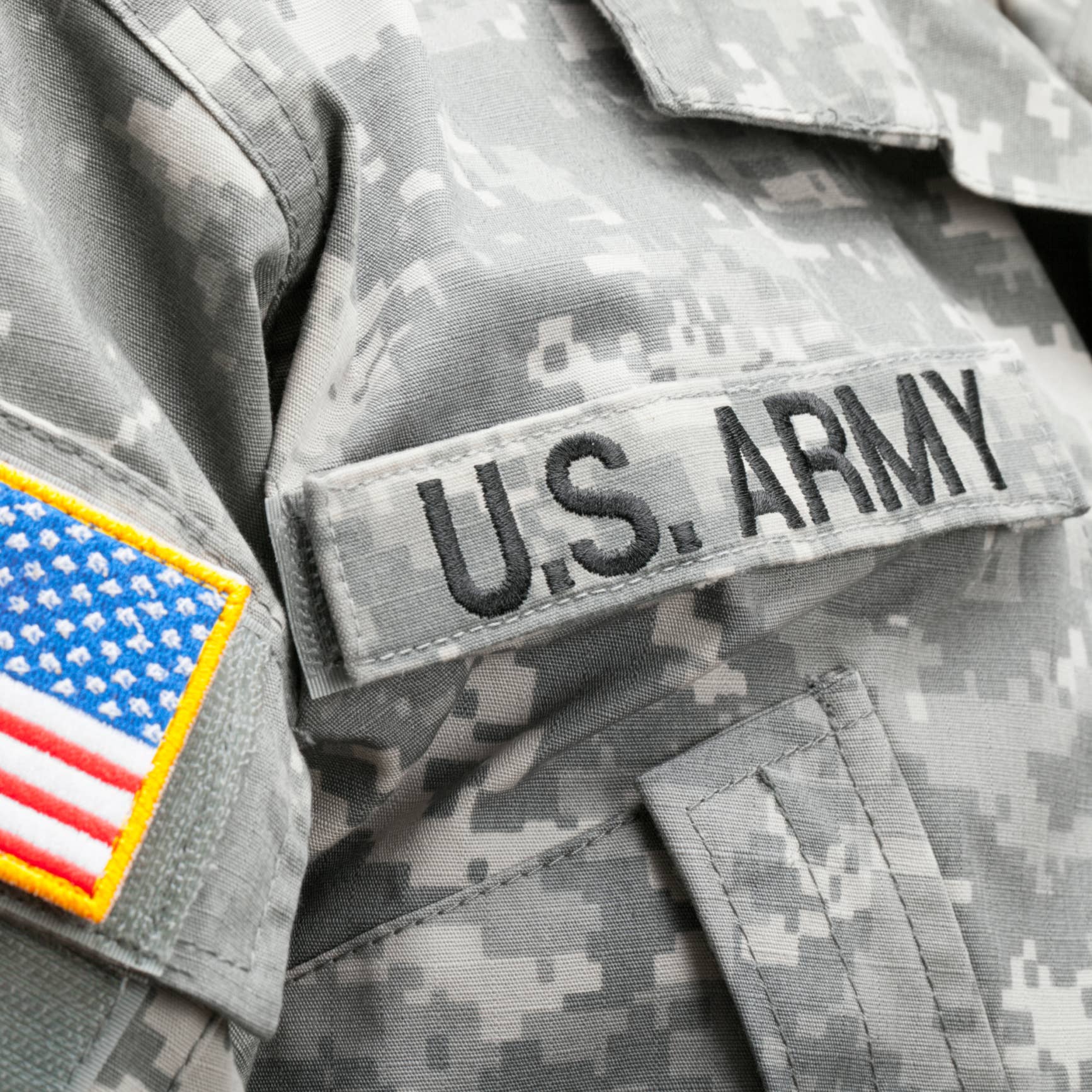 USA flag and U.S. Army patch on solder's uniform