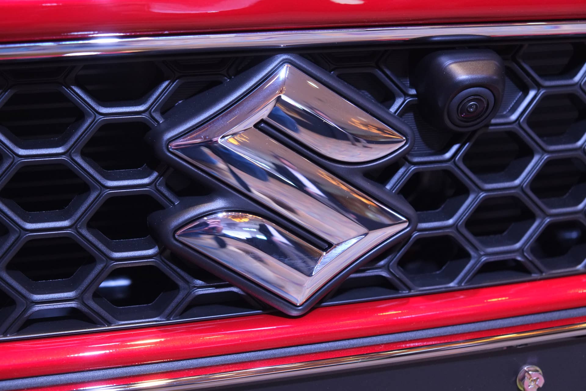 The logo of Japan's Suzuki Motor Corporation is seen displayed on the company's improved compact hybrid vehicle 'Swift' during a press preview in Tokyo on December 27, 2016. Sales of the new Suzuki Swift hybrid car start on January 4, 2017. / AFP / KAZUHIRO NOGI (Photo credit should read KAZUHIRO NOGI/AFP/Getty Images)