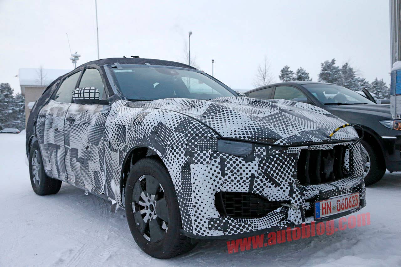 maserati levante spy shot front three quarters