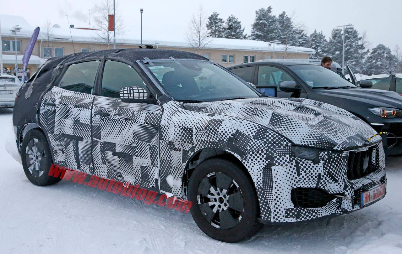 maserati levante spy shot three quarters
