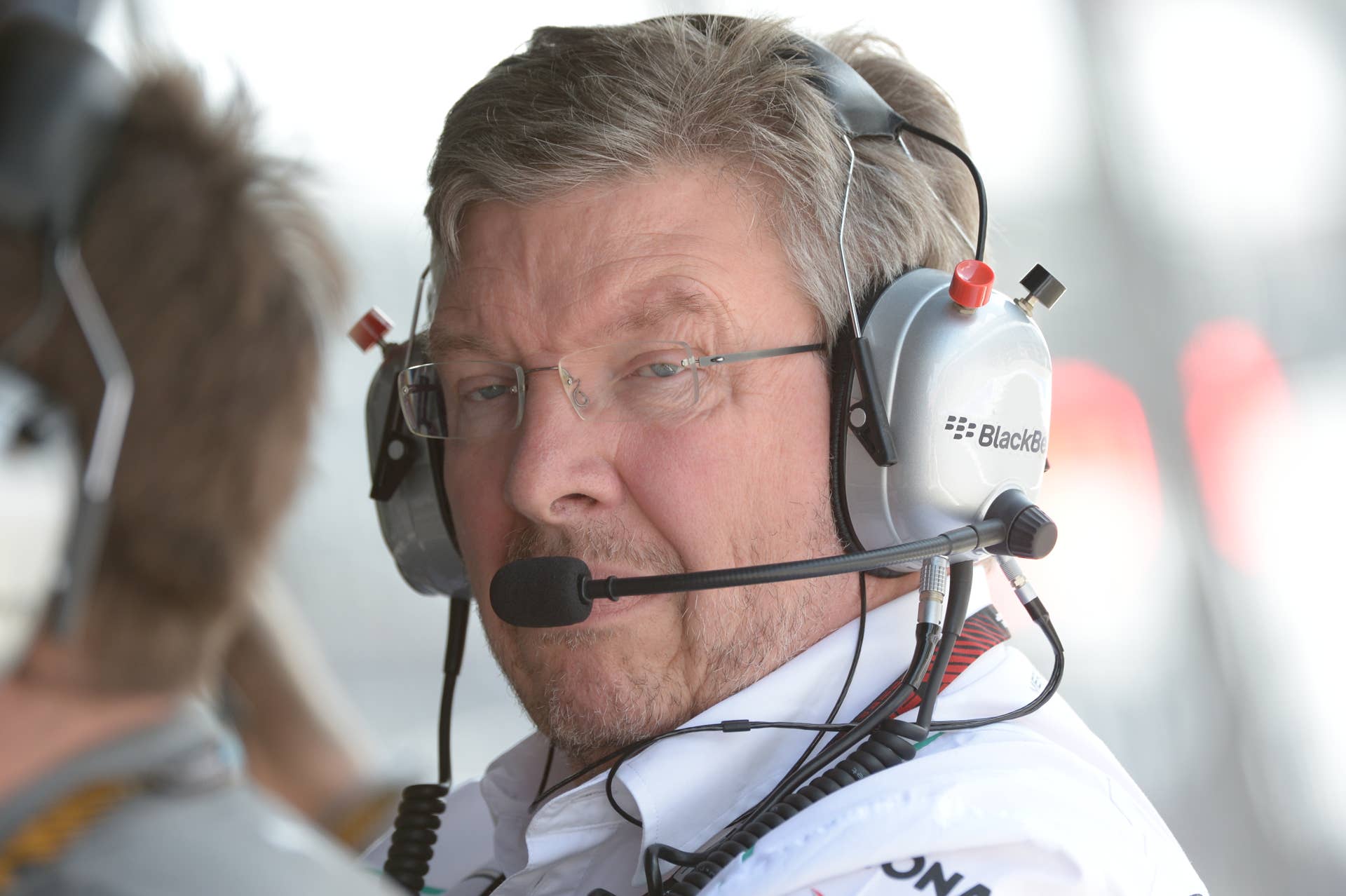 Mercedes Team Principal Ross Brawn stands in the pits during the qualifying session at the Nurburgring race track on July 6, 2013 in Nurburg ahead of the German Formula One Grand Prix. AFP PHOTO / PETER STEFFEN (Photo credit should read PETER-STEFFEN/AFP/Getty Images)