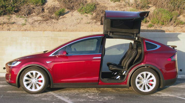 tesla model x with open falcon wing doors