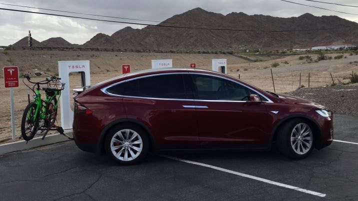 tesla model x at supercharger