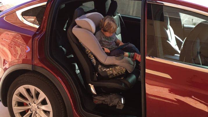 Kid in a Tesla Model X
