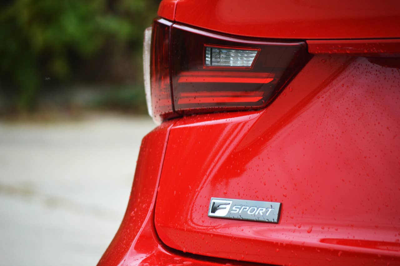 Lexus is 200t red f sport badge