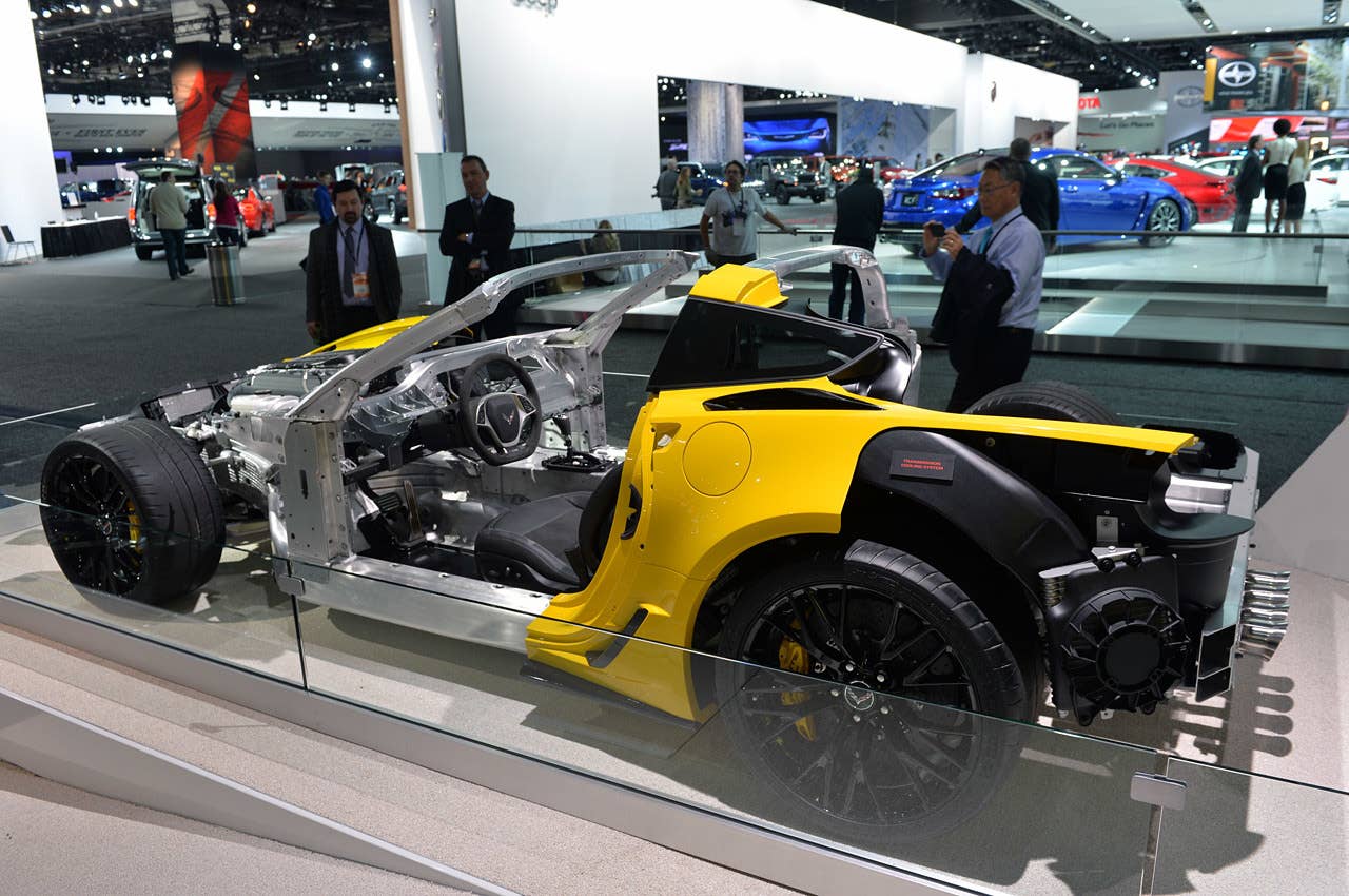 This rear three-quarter view provides a clean look at the left rear wheel and composite brake package. While two-piece steel rotors are standard, those who upgrade will find four-piston aluminum monobloc calipers clamping down on lightweight rotors that are 15.3 inches in diameter in the rear. The rear tires are 335/25ZR20.