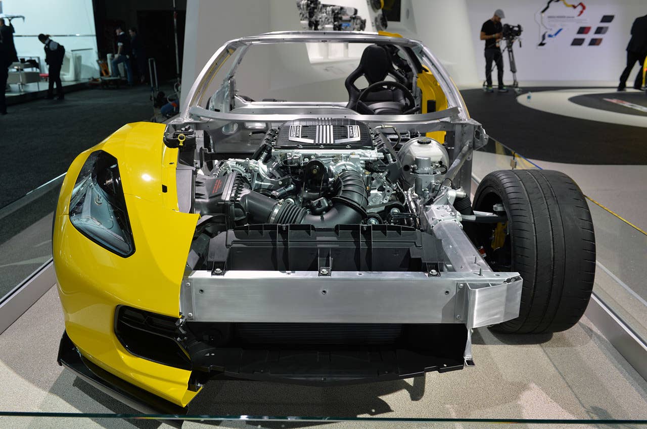 A nice, square shot of the front of the C7 Corvette Z06. The supercharged, 6.2-liter generates a lot of heat. As a result, nearly the entire front end is dedicated to scooping cold air through its angled water-to-air radiator. The engine air intake is angled towards the passenger side, where it breathes through the fender.
