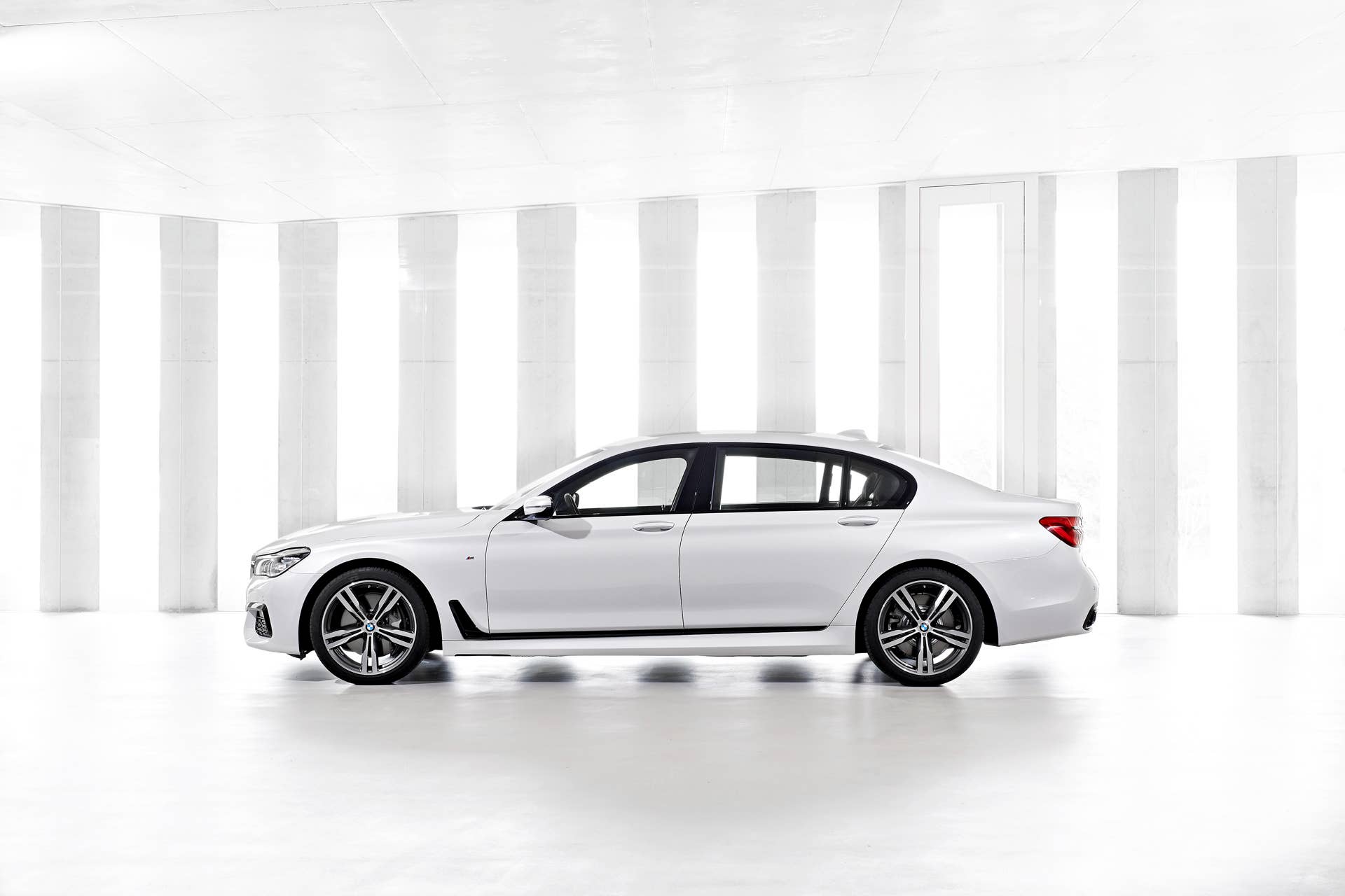 studio bmw 7 series parked m white