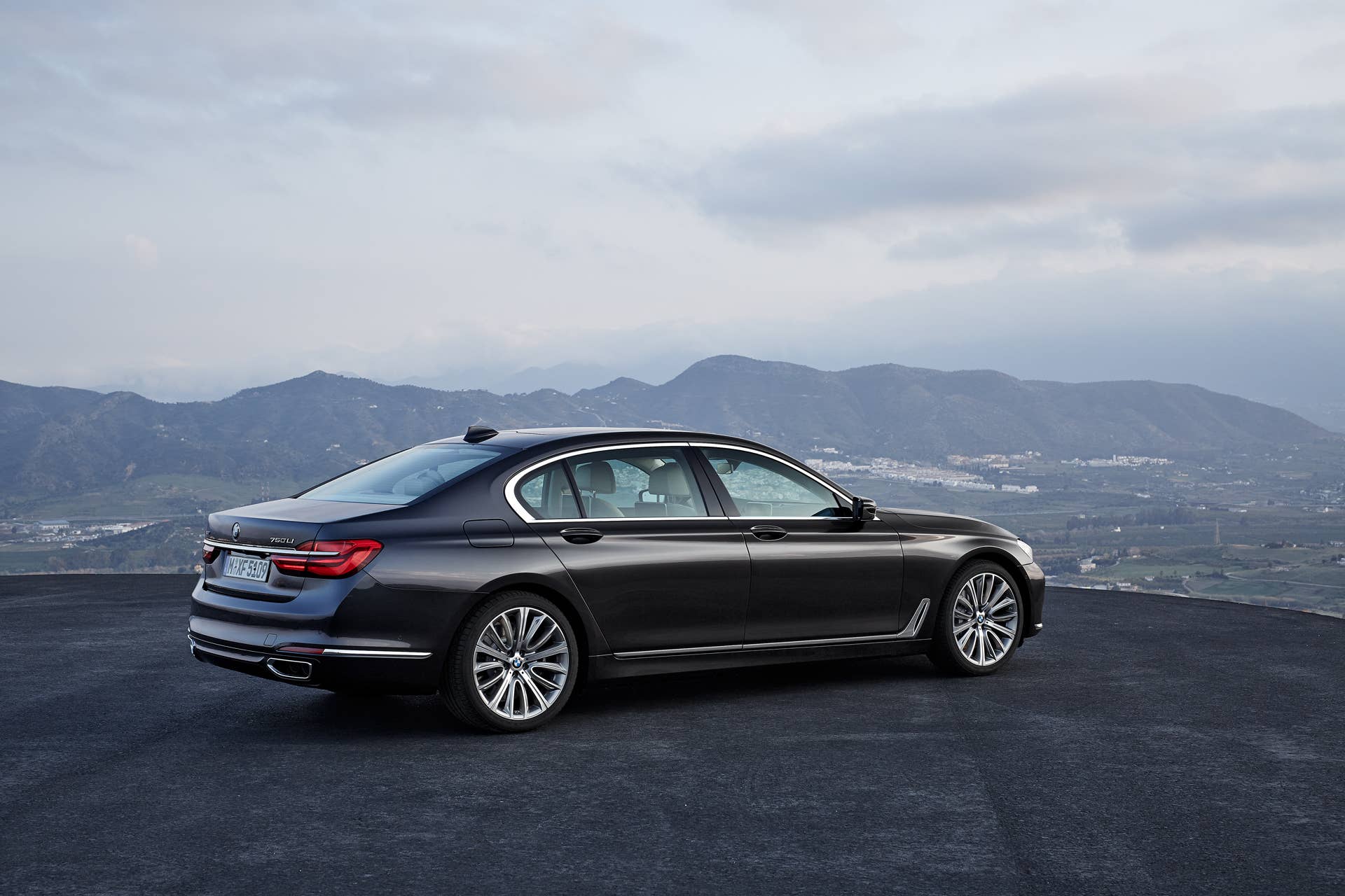 bmw black 7 series rear mountain