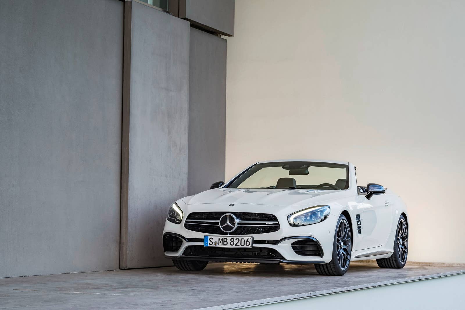 white 2017 mercedes sl front building
