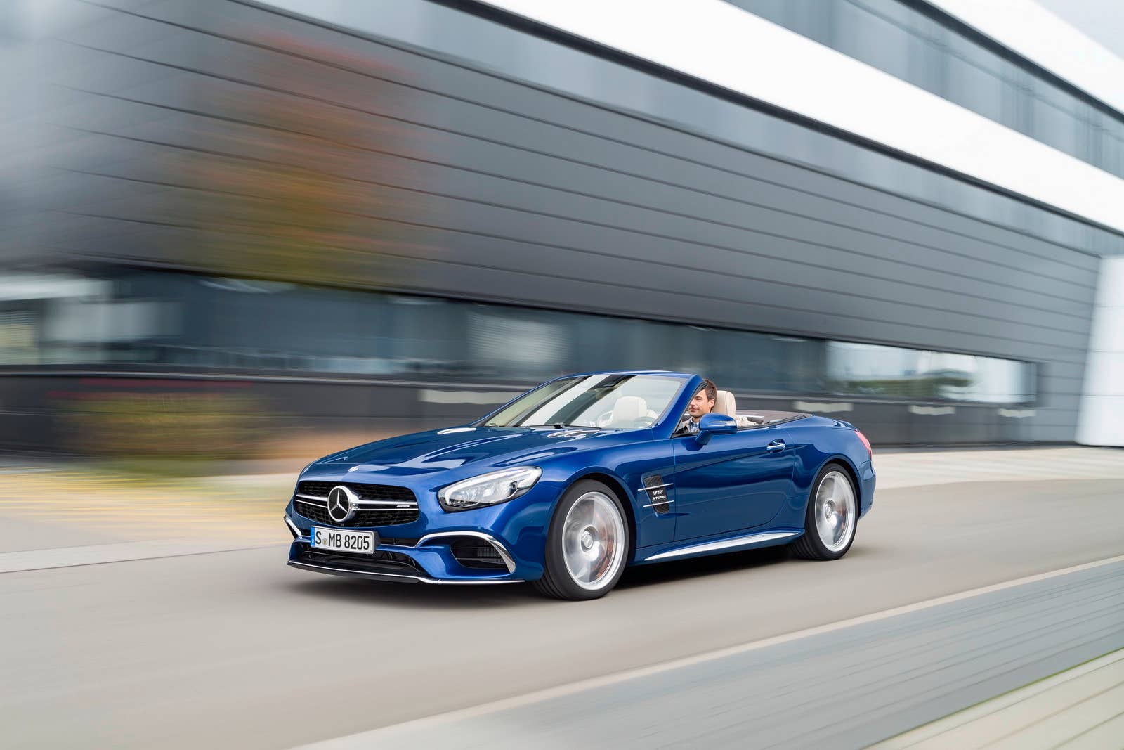 blue 2017 mercedes sl low three quarters road