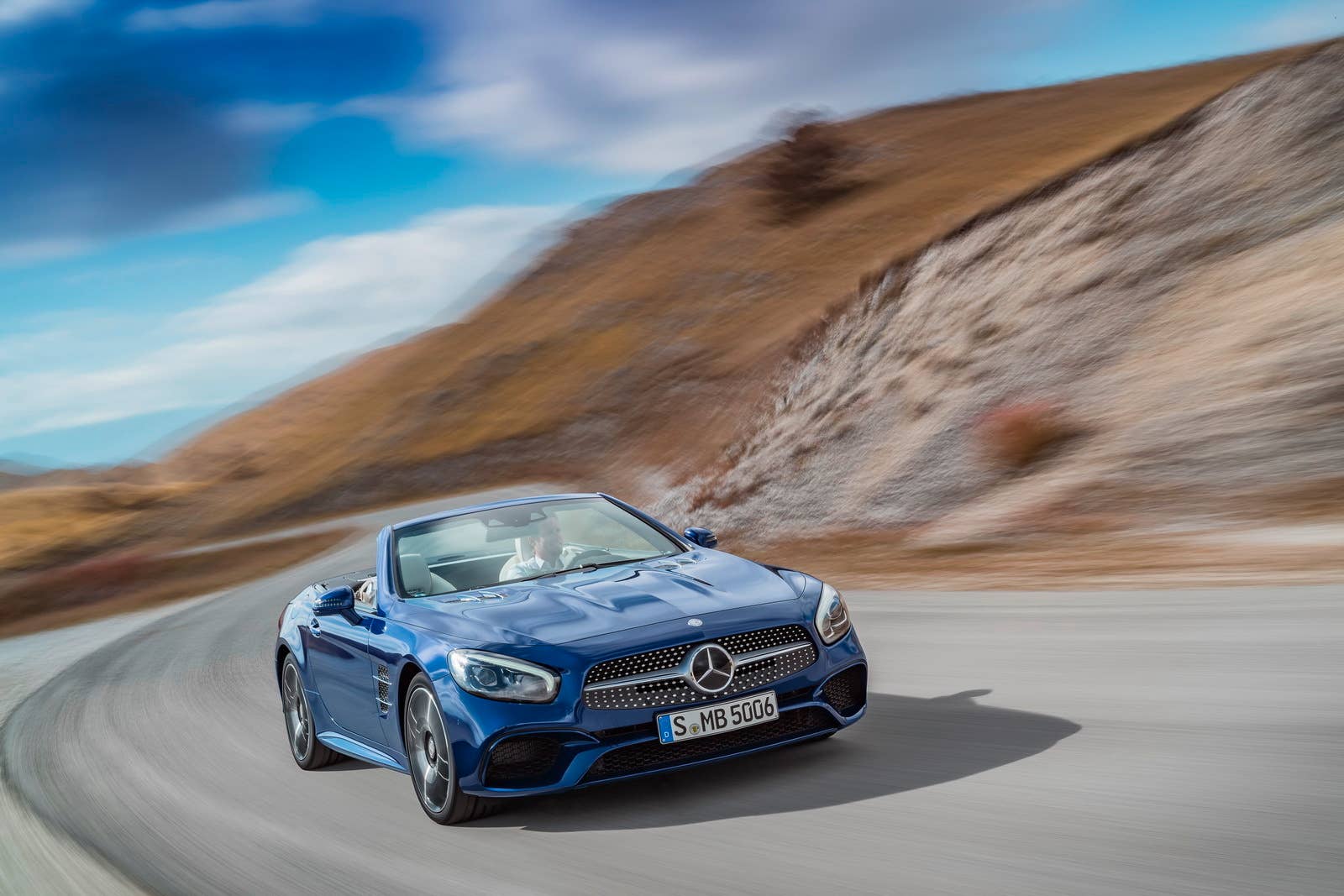 blue 2017 mercedes sl curves