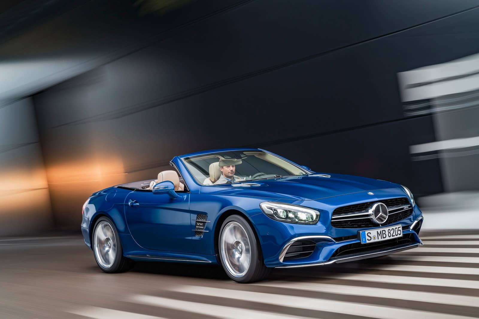 blue 2017 mercedes sl front three quarters road