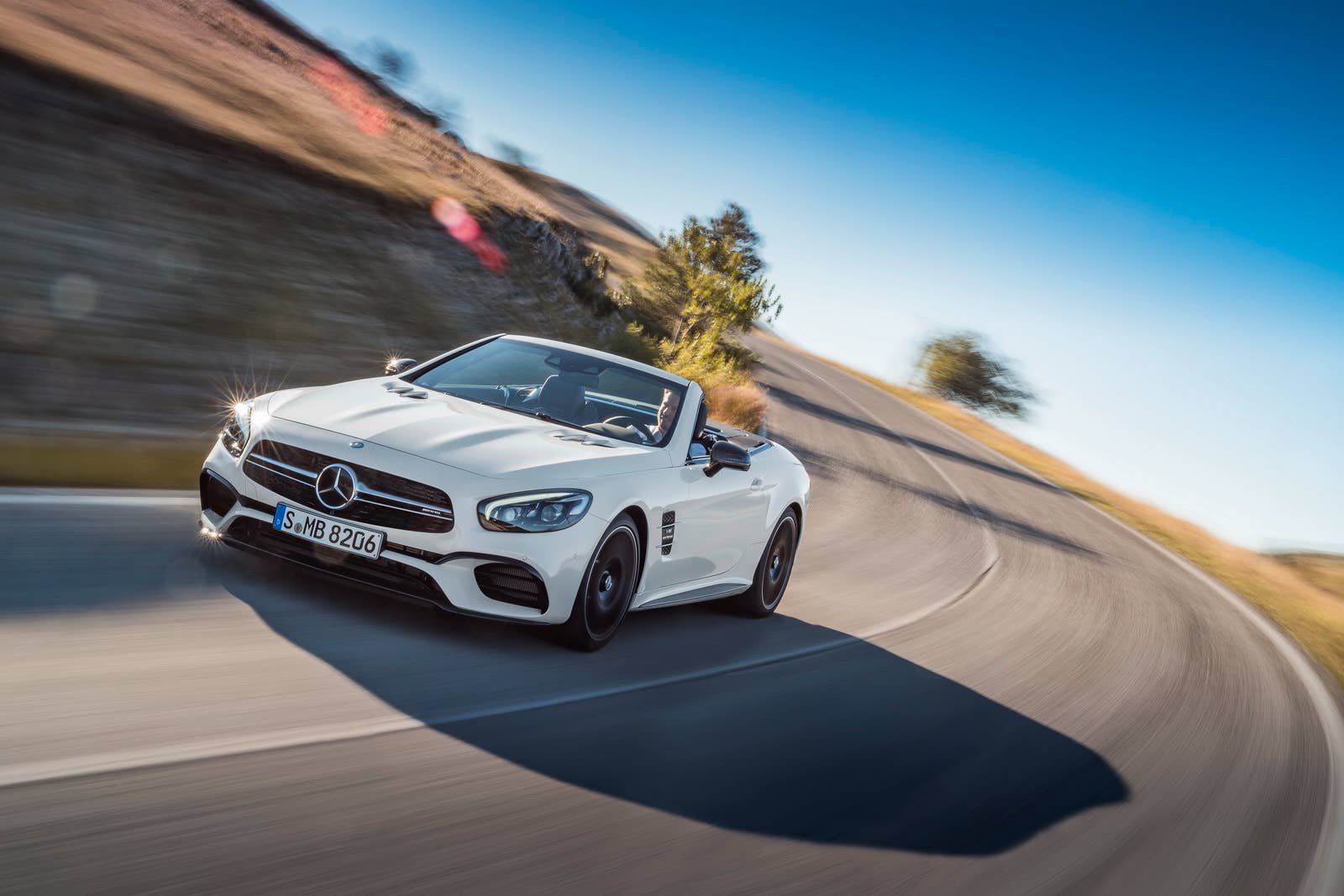 white 2017 mercedes sl  curves