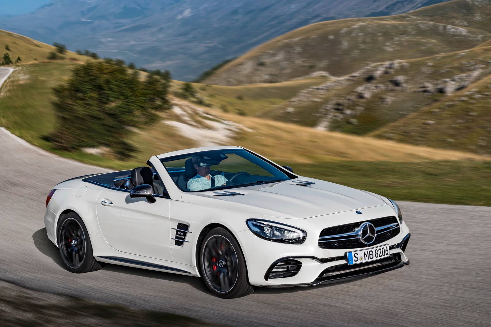 white 2017 mercedes sl mountain road