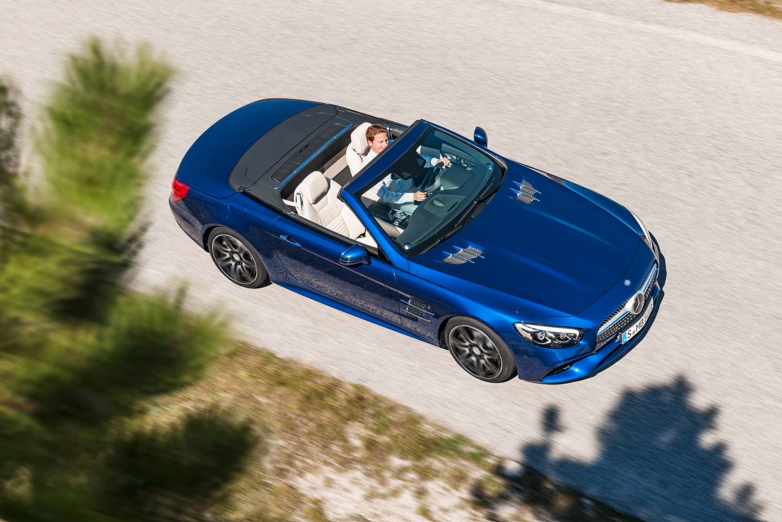 blue 2017 mercedes sl top down above