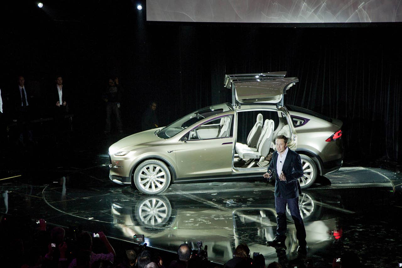 elon musk with tesla model x