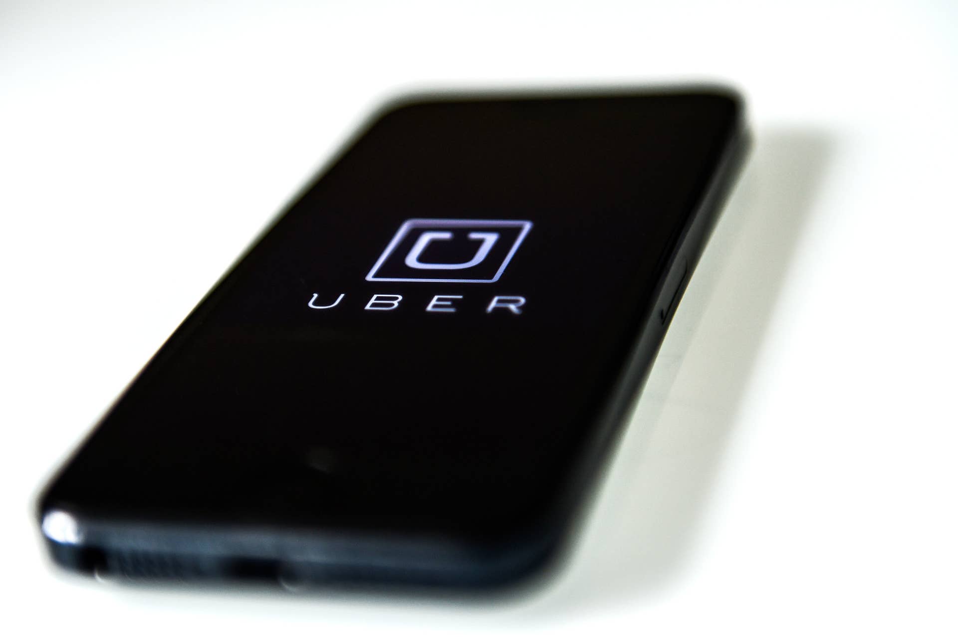 BARCELONA, SPAIN - JULY 01:  In this photo illustration, the app 'Uber' is launched in a smart phone on July 1, 2014 in Barcelona, Spain. Taxi drivers in main cities strike over unlicensed car-halling services. Drivers say that is a lack of regulation behind the new app.  (Photo Illustration by David Ramos/Getty Images)