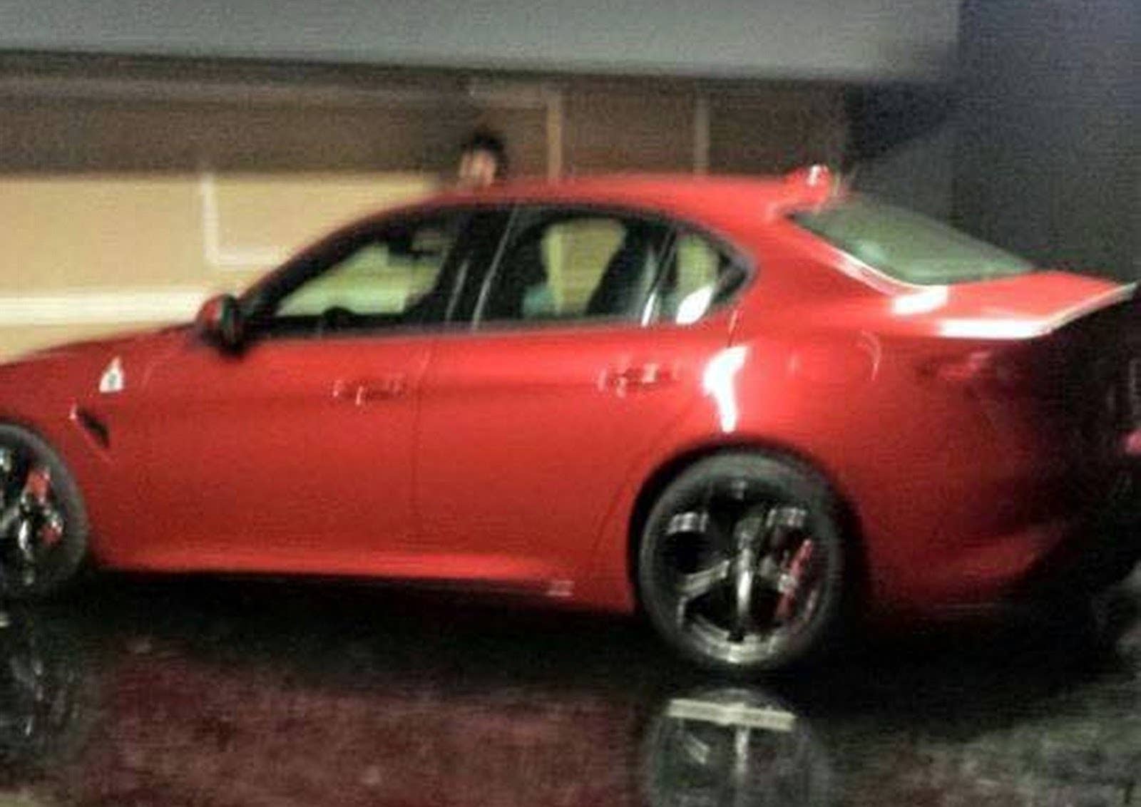 red alfa romeo giulia spy shot rear
