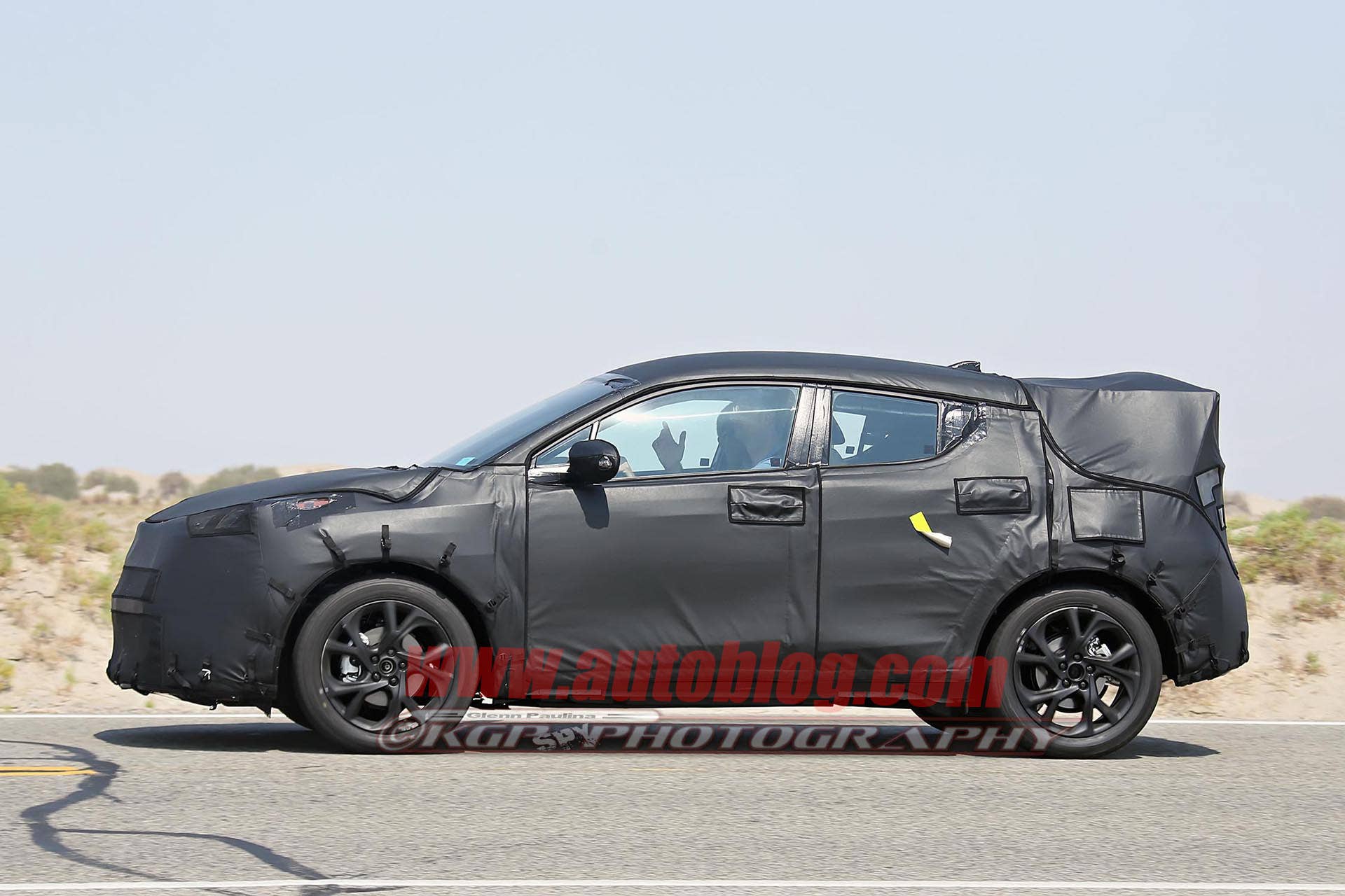 camo nissan juke spied toyota scion fighter