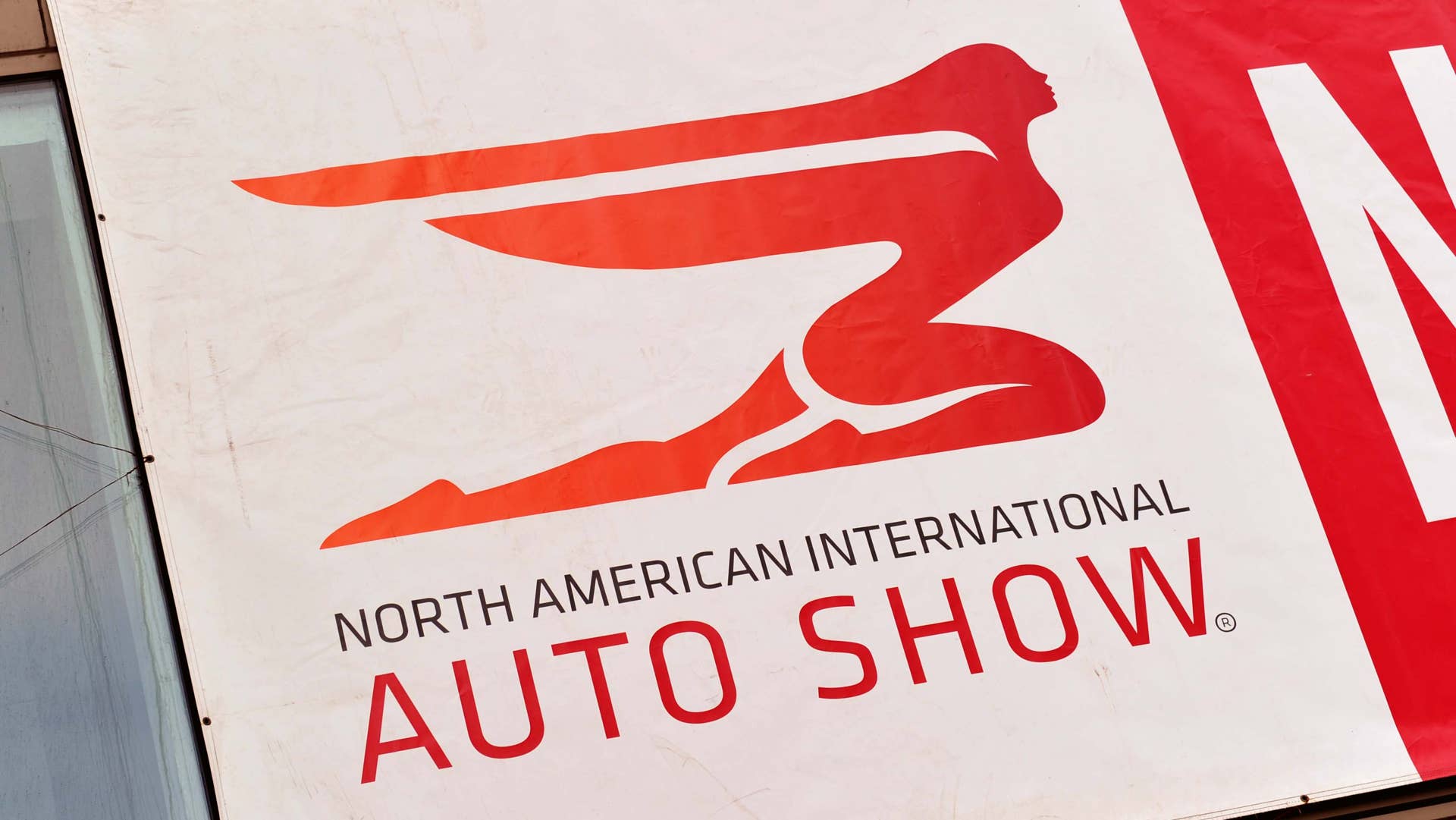 A sign outside Cobo Hall as preparations are made for the North American International Auto Show January 12, 2014 in Detroit, Michigan. The 2014 Detroit Auto Show runs January 13-16. AFP PHOTO/Stan HONDA (Photo credit should read STAN HONDA/AFP/Getty Images)