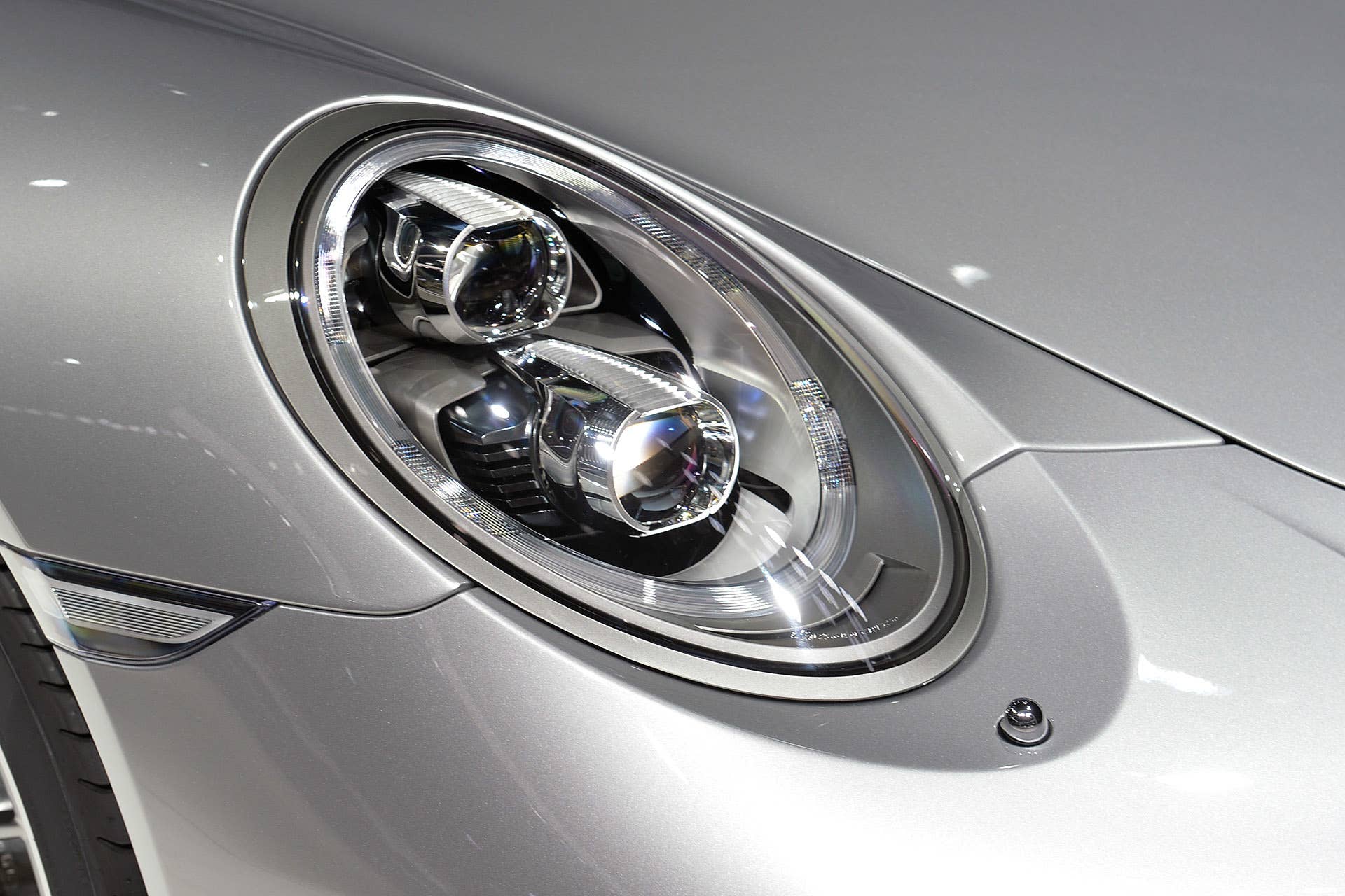 The 2016 Porsche 911 Carrera, now with a turbocharged engine in the standard car, unveiled at the Frankfurt Motor Show, headlight.