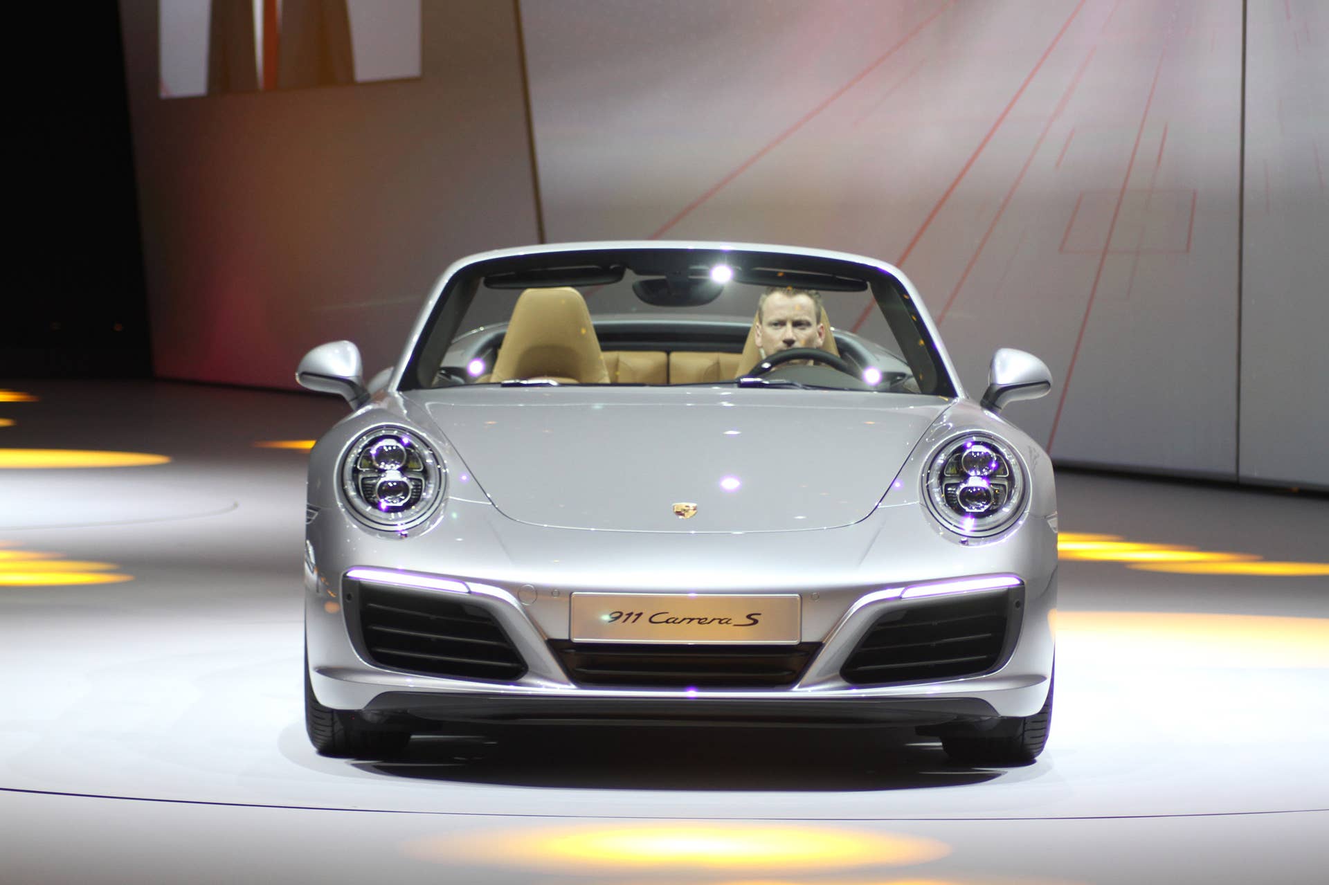 The 2016 Porsche 911 Carrera S Cabriolet, now with a turbocharged engine in the standard car, unveiled at Volkswagen's Group Night ahead of the 2015 Frankfurt Motor Show, front view.