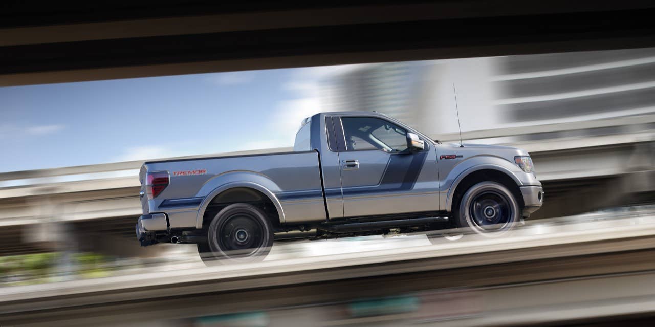 2014 Ford F-150 Tremor: Tremor signals its sport truck capabilities with an appearance package that borrows the stealthy, flat-black accents, with a unique 20-inch flat-black wheel, a stylized bodyside graphic and black badges with red lettering from the FX Appearance Package. (06/27/2013)