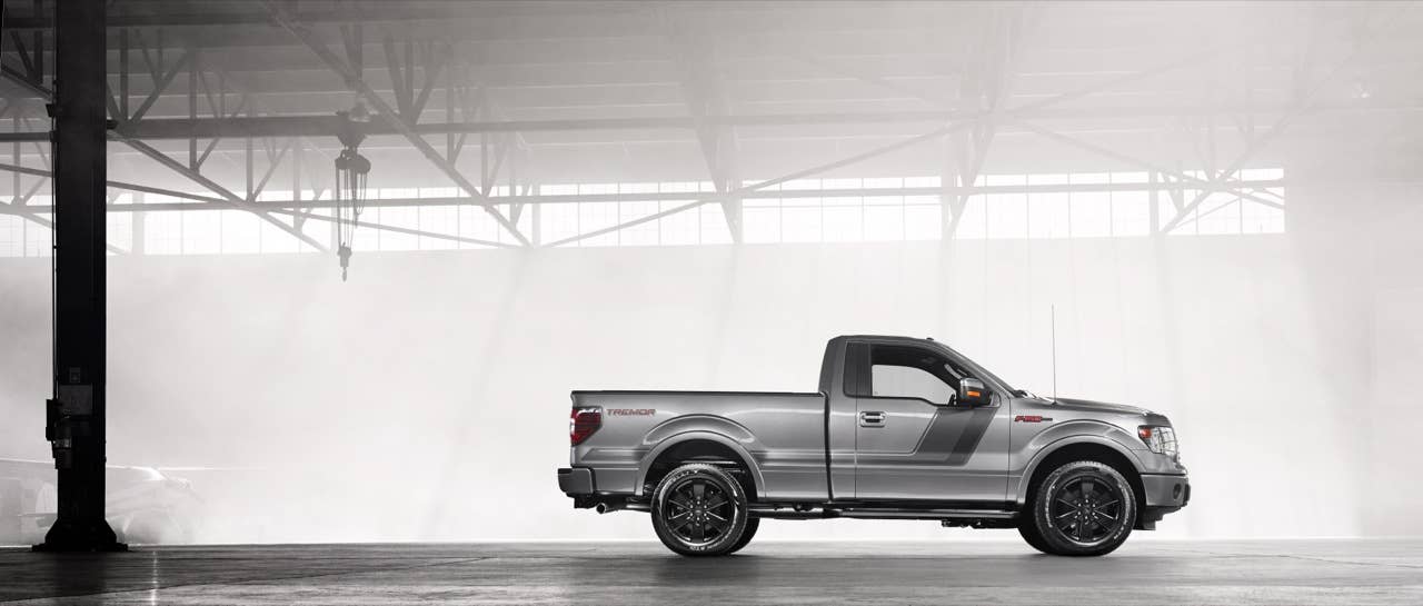 2014 Ford F-150 Tremor: Tremor signals its sport truck capabilities with an appearance package that borrows the stealthy, flat-black accents, with a unique 20-inch flat-black wheel, a stylized bodyside graphic and black badges with red lettering from the FX Appearance Package. (06/27/2013)