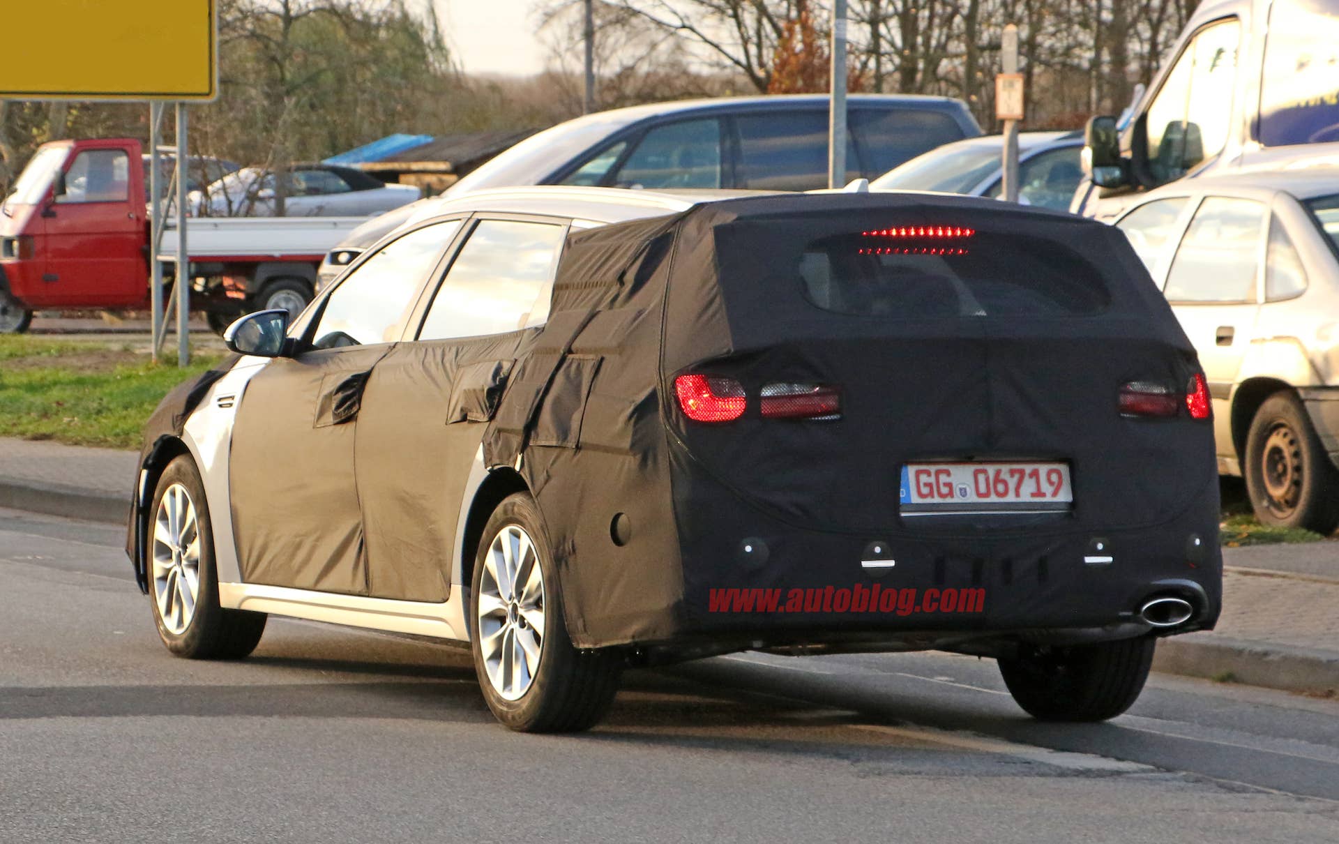 Kia Sportswagon prototype caught by spy photographers, rear three-quarter view.
