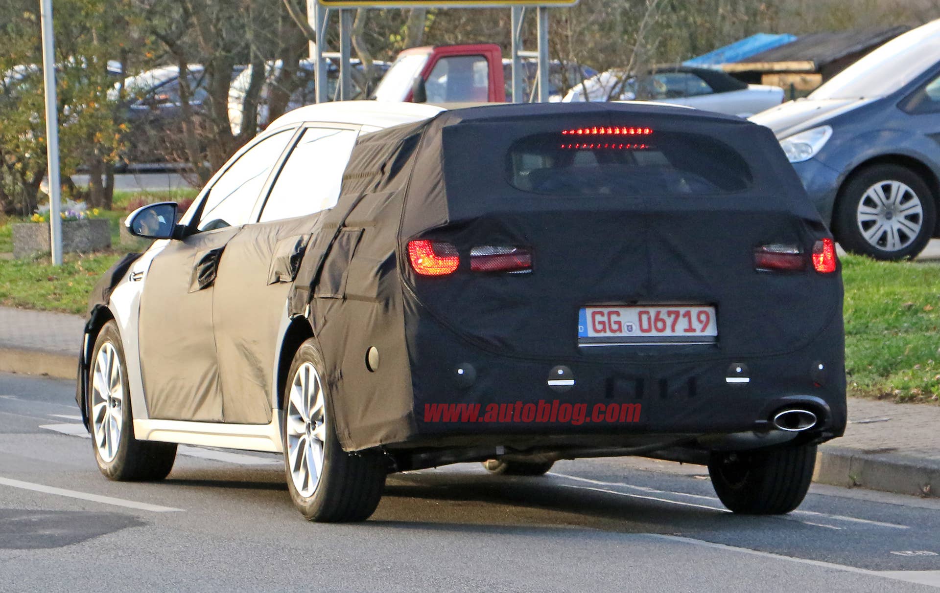 Kia Sportswagon prototype caught by spy photographers, rear three-quarter.