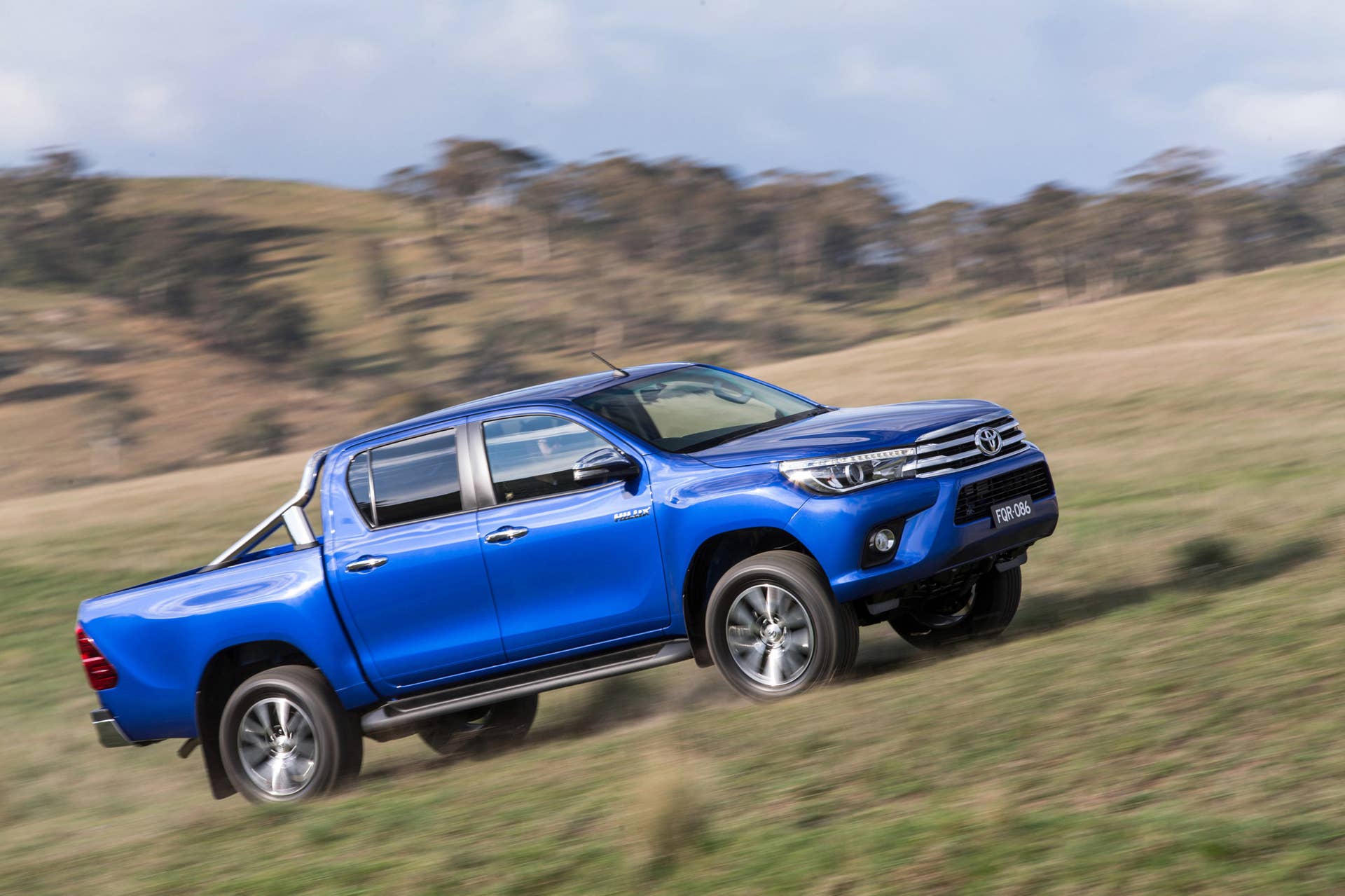 2016 Toyota HiLux pickup truck driving uphill