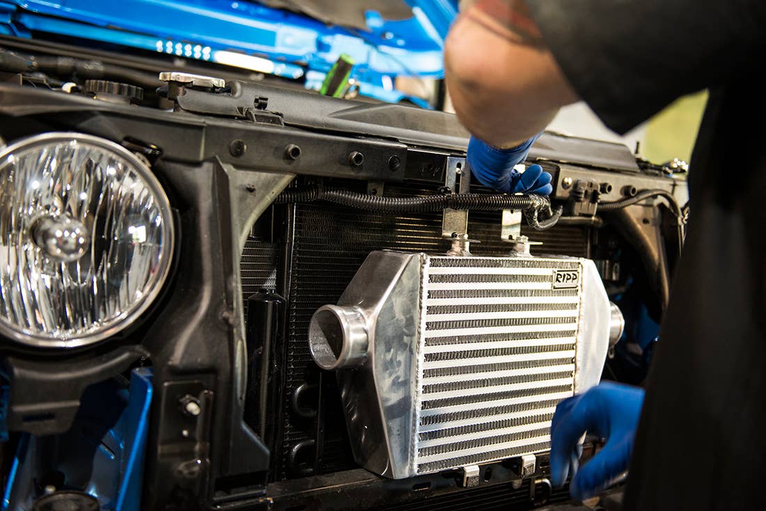 Project Trail Force 2015 Jeep Wrangler Rubicon supercharger intercooler.