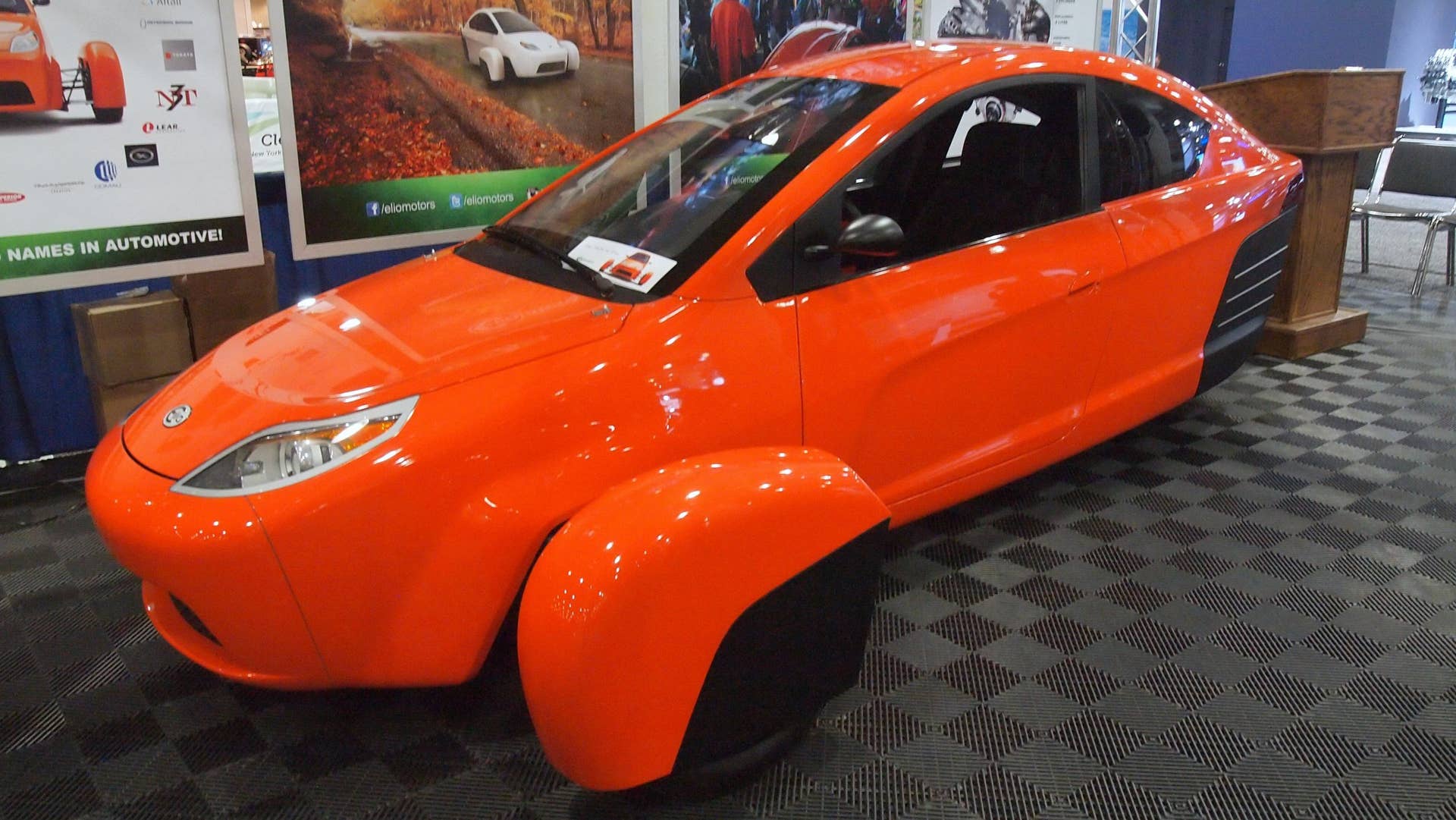 Elio Motors orange trike front three-quarter
