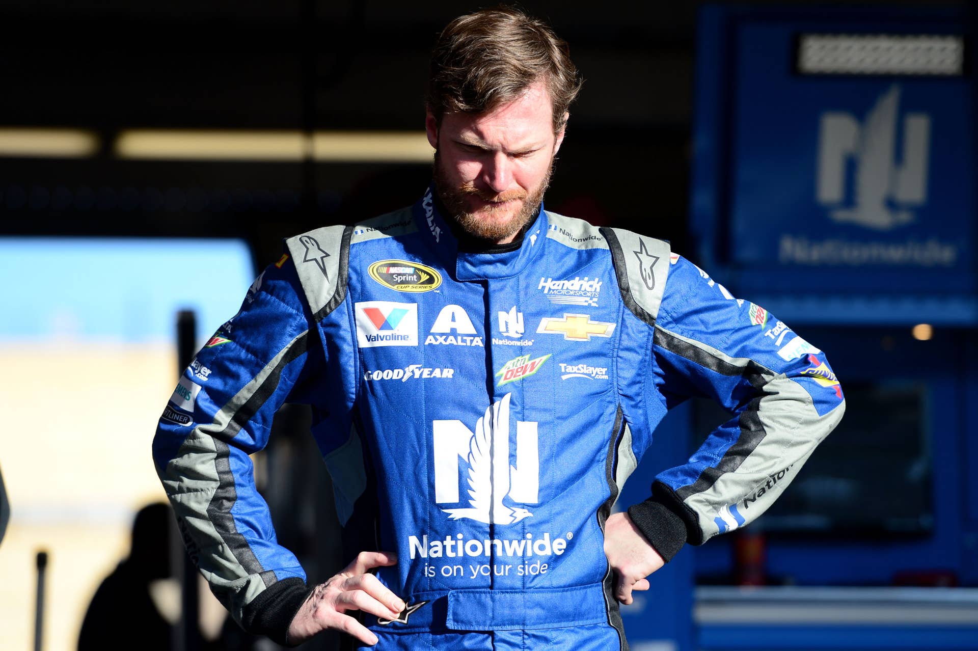 AVONDALE, AZ - JANUARY 31: Monster Energy NASCAR Cup Series driver Dale Earnhardt Jr. reacts in the garage during testing at Phoenix International Raceway on January 31, 2017 in Avondale, Arizona. (Photo by Jennifer Stewart/Getty Images)