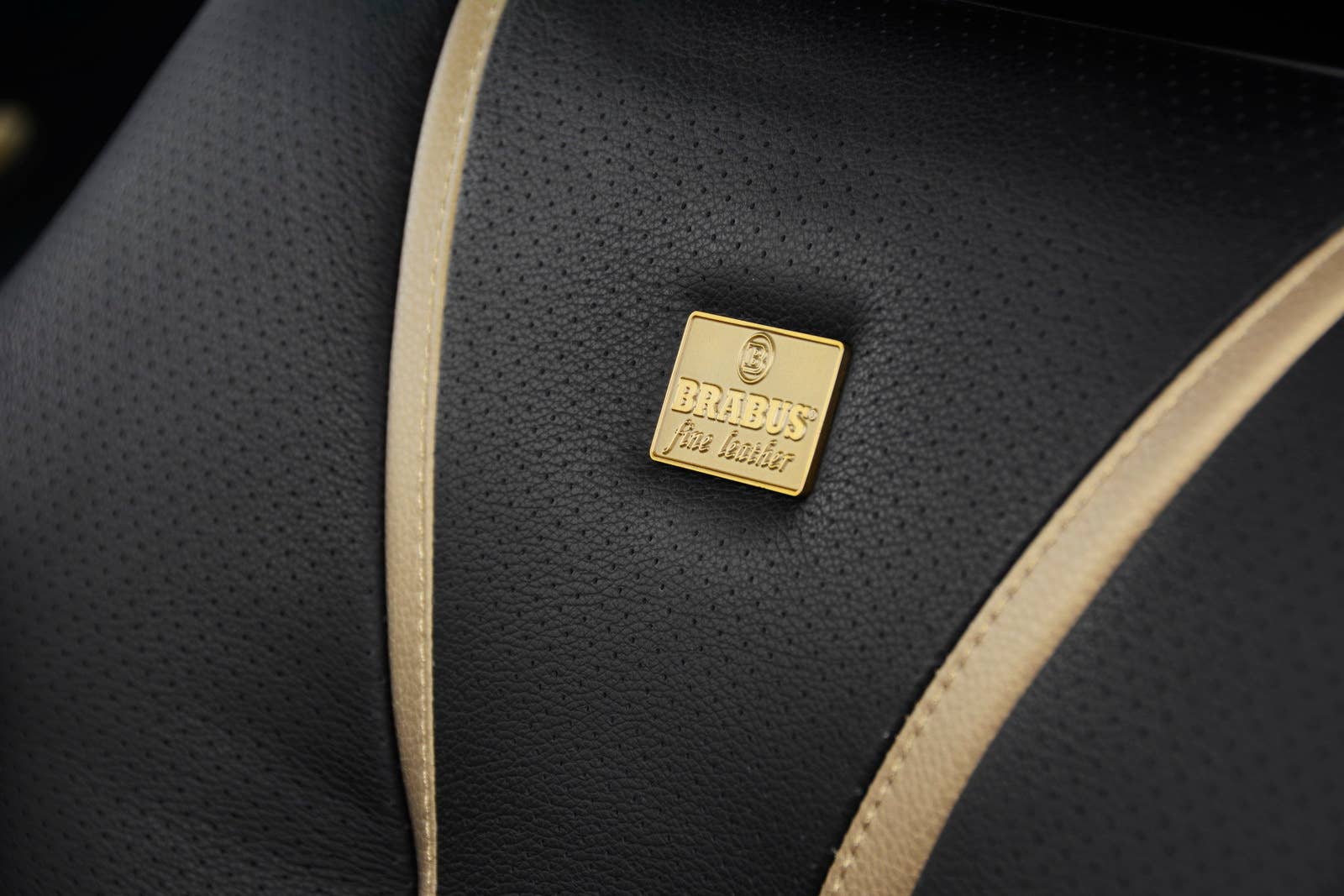 Brabus Rocket 900 Desert Gold Edition studio interior badge