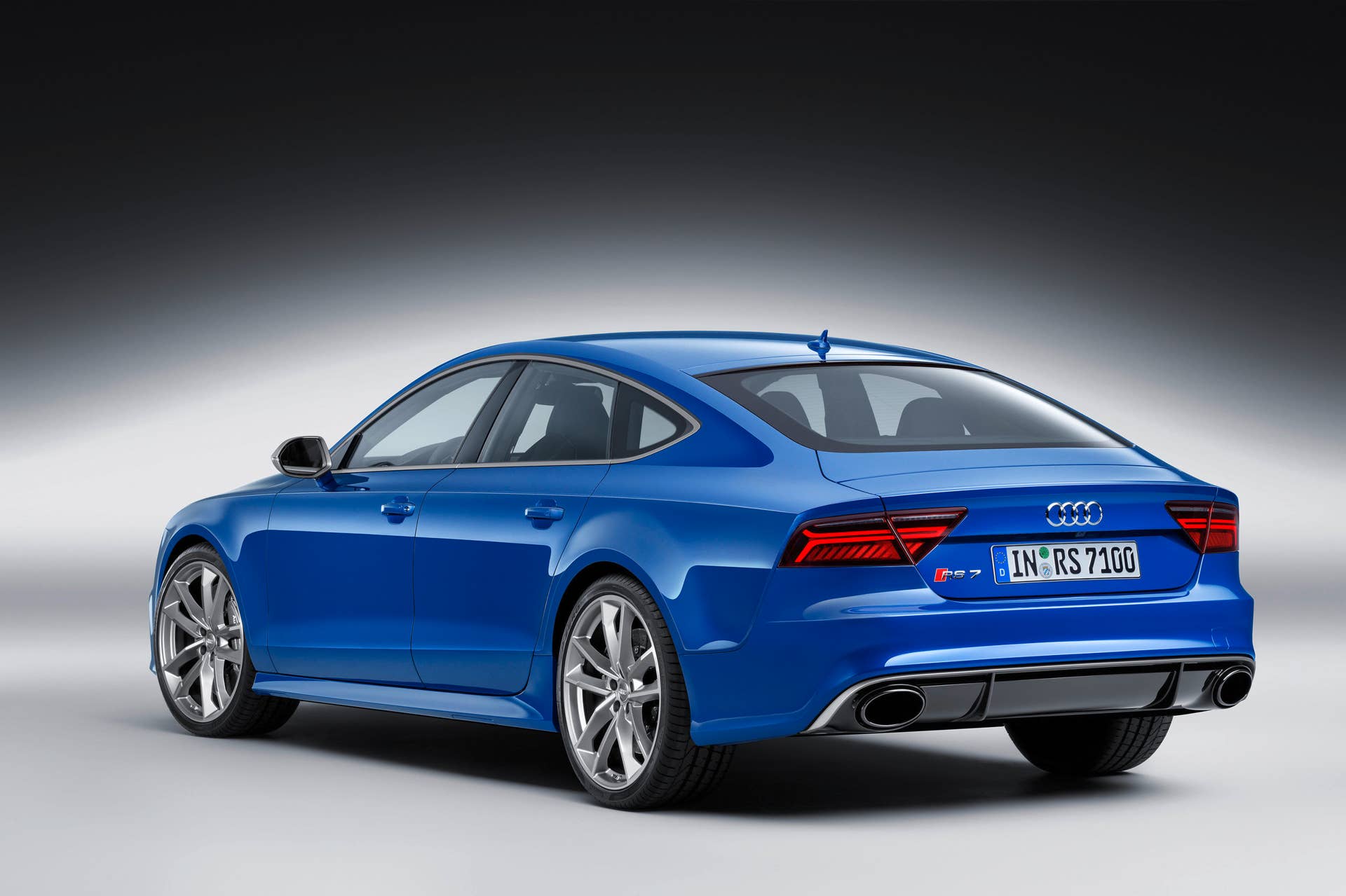 blue audi rs7 sportback performance rear three quarters studio