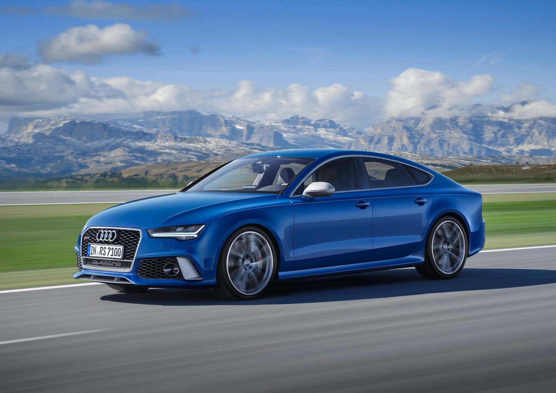 blue audi rs7 sportback performance front three quarters on road