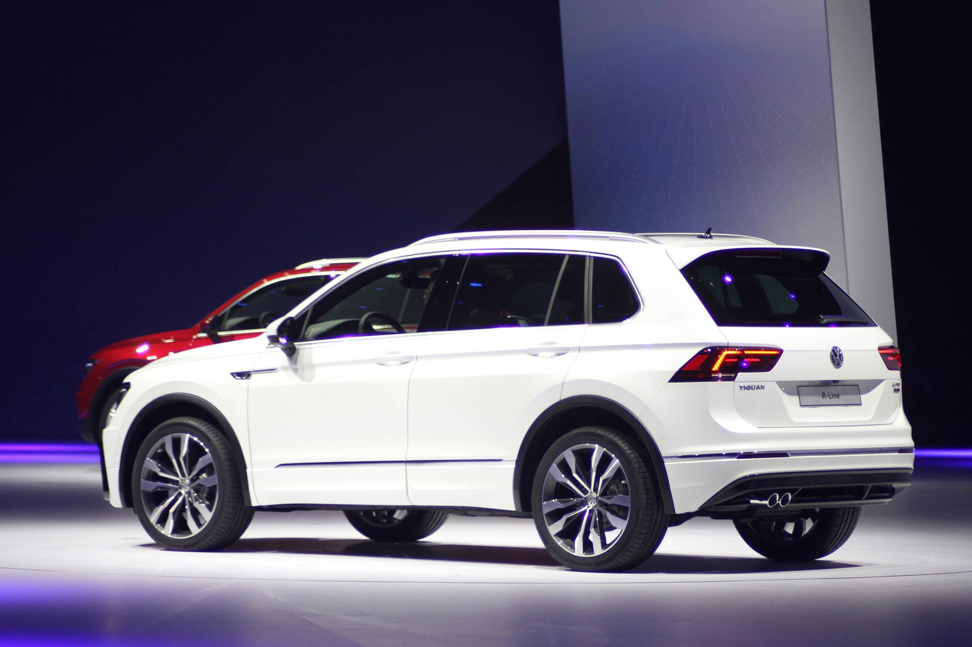 The 2016 Volkswagen Tiguan R-Line, unveiled at Volkswagen's Group Night ahead of the 2015 Frankfurt Motor Show, rear three-quarter view.