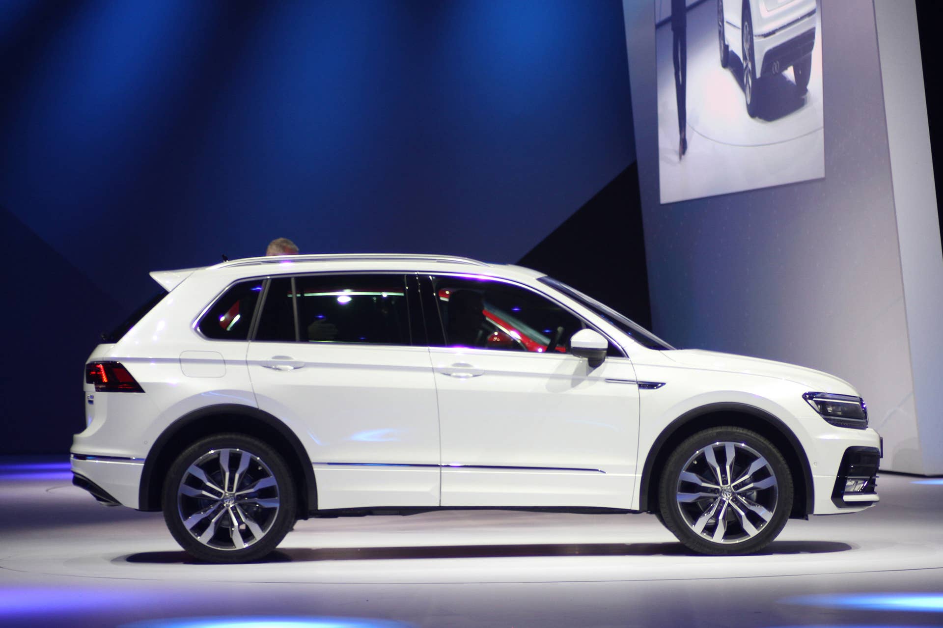 The 2016 Volkswagen Tiguan R-Line, unveiled at Volkswagen's Group Night ahead of the 2015 Frankfurt Motor Show, side view.