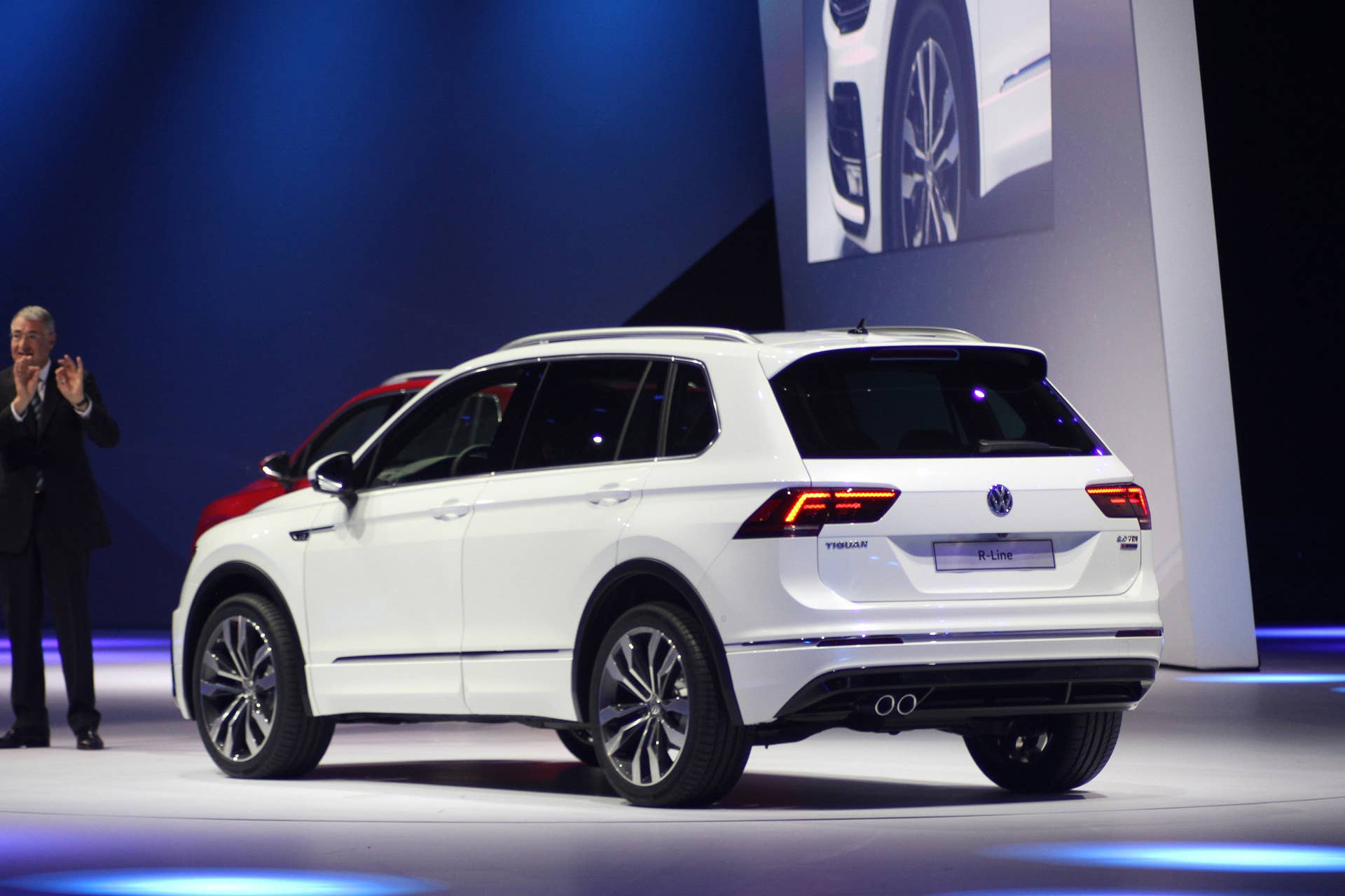 The 2016 Volkswagen Tiguan R-Line, unveiled at Volkswagen's Group Night ahead of the 2015 Frankfurt Motor Show, rear three-quarter.