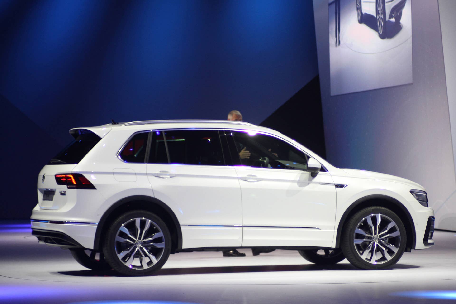 The 2016 Volkswagen Tiguan R-Line, unveiled at Volkswagen's Group Night ahead of the 2015 Frankfurt Motor Show, side view.