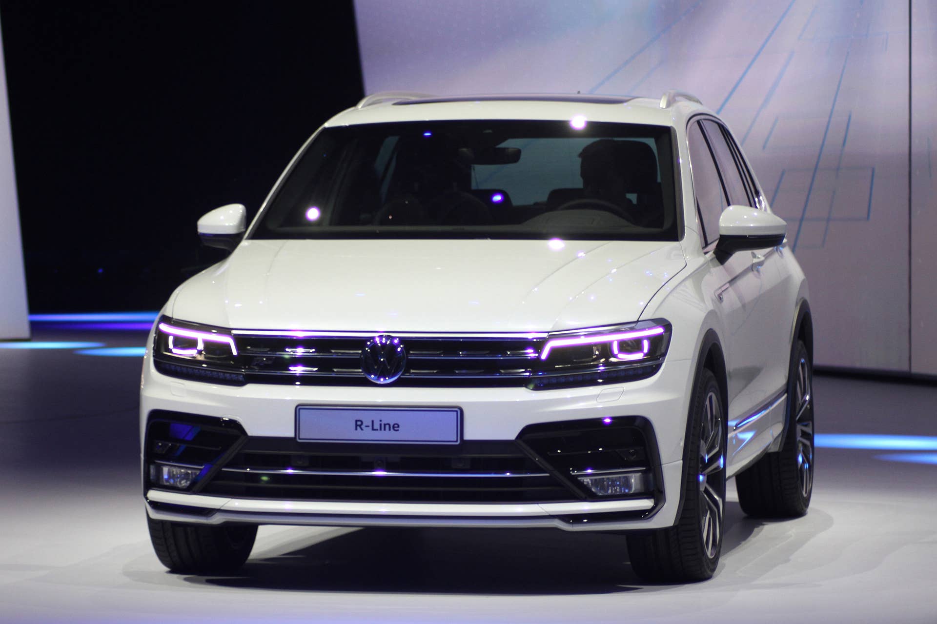 The 2016 Volkswagen Tiguan R-Line, unveiled at Volkswagen's Group Night ahead of the 2015 Frankfurt Motor Show, close front three-quarter.